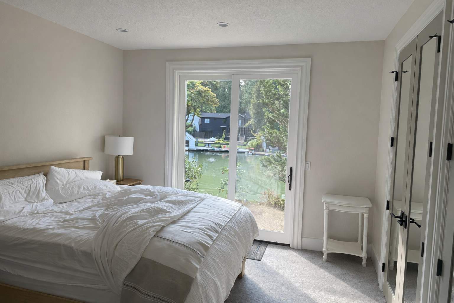 Custom Drapery for a Primary Bedroom with Lake Oswego Views by Budget Blinds Central Portland