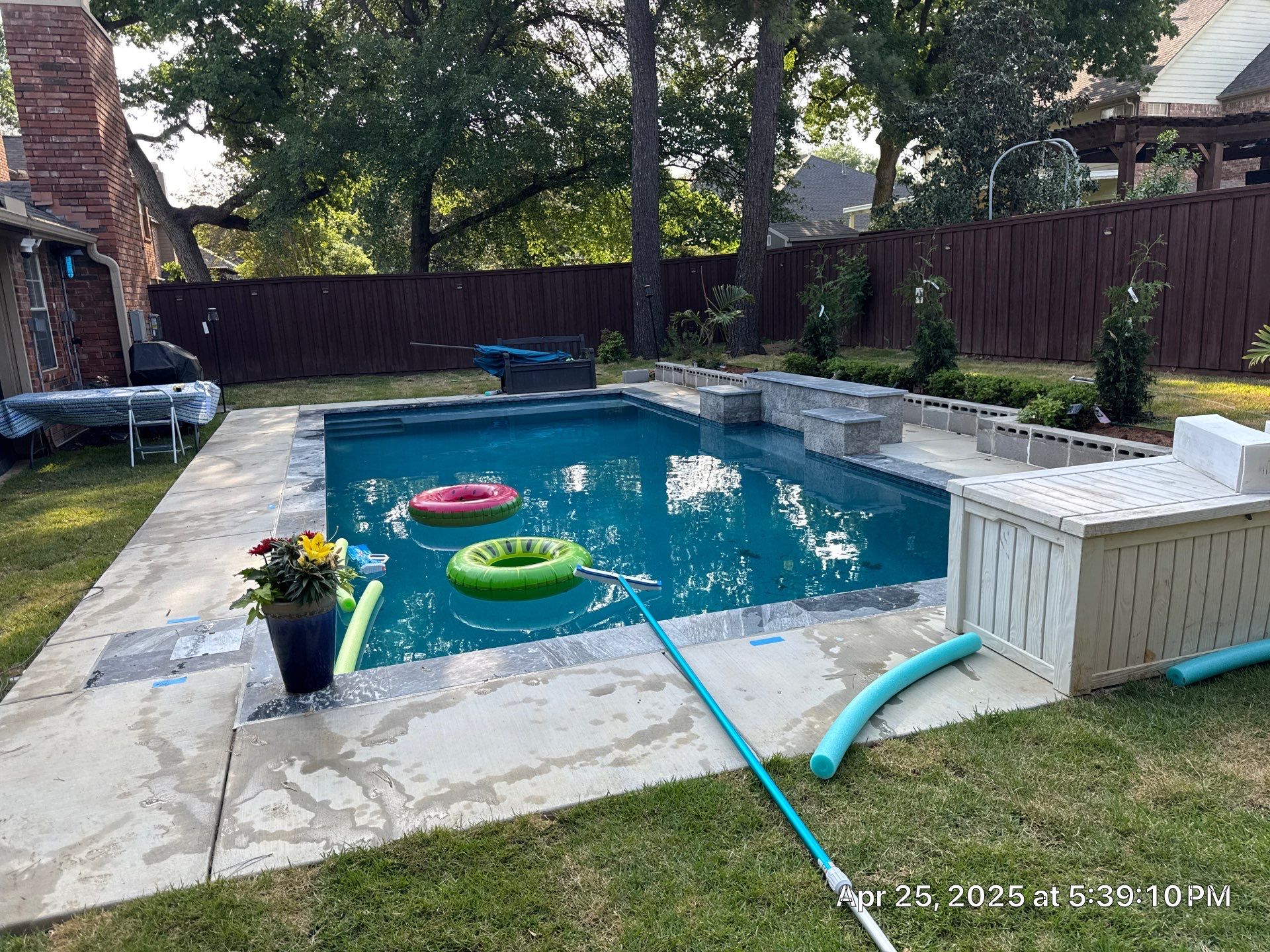 Geometric Pool with Raised Water-Feature Wall by Pinnacle Pools and Spas - DFW