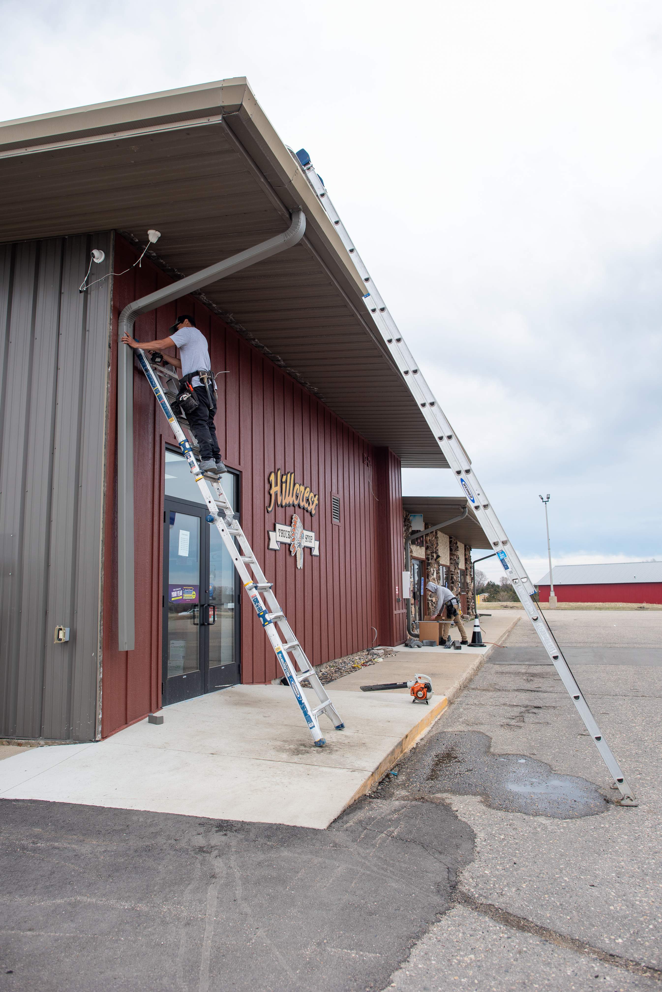 Commercial Gutter Repair in New London MN | Reseaming Gutters & New Downspouts by Next Level Seamless Gutters / Exteriors Inc.