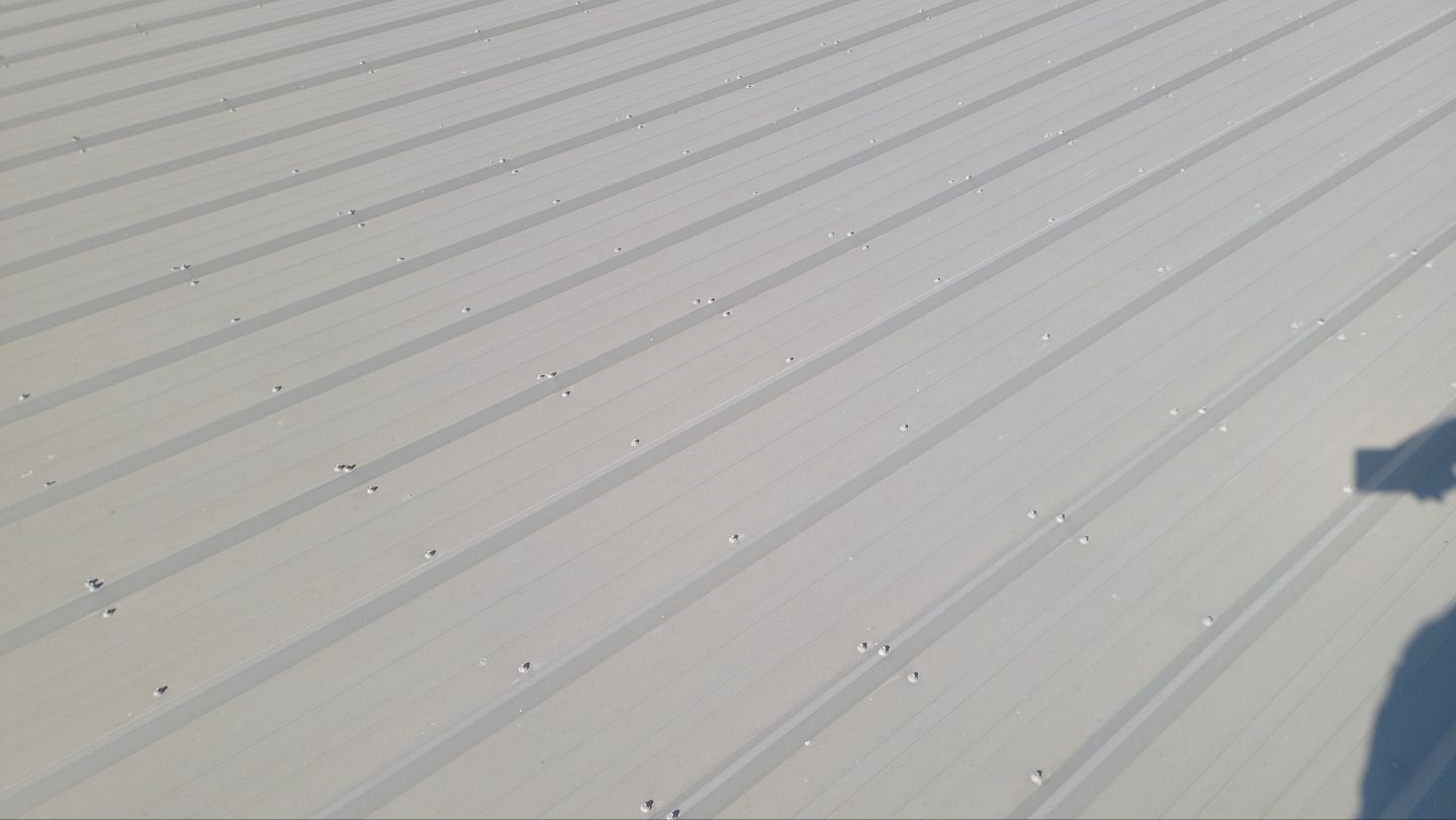 Commercial Roof Replacement – PBR Metal Panels After Hail Damage by ASAP Roofing & Exteriors
