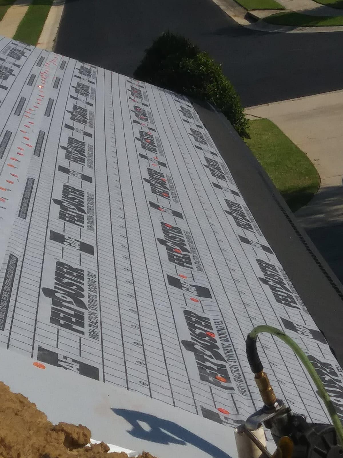 Residential Roofing Installation using Roof Replacement by American Roofing & Construction LLC
