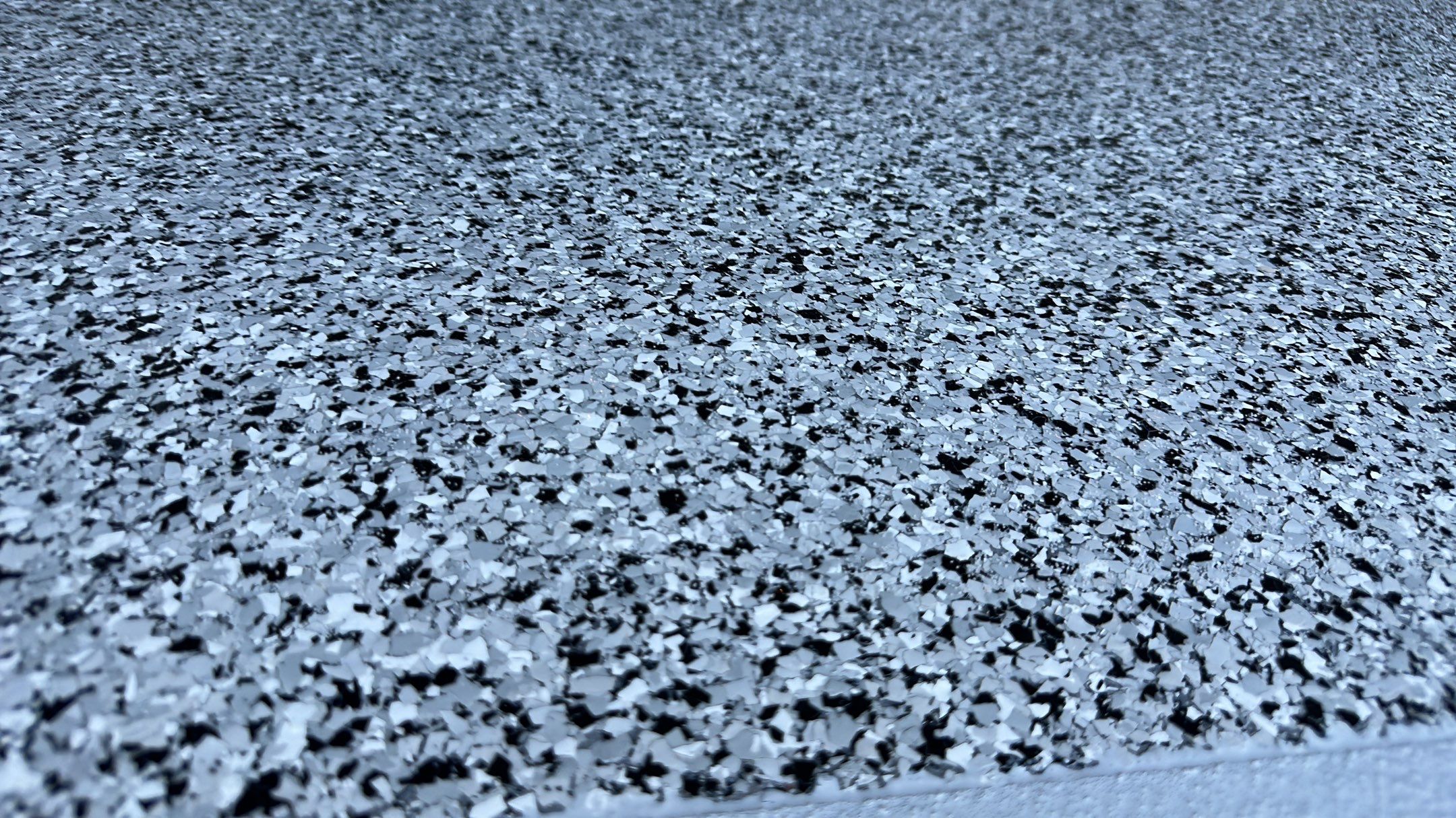 Sandy S. transformed her garage with a Banner Garage Floor and a cabinets by Banner Garage