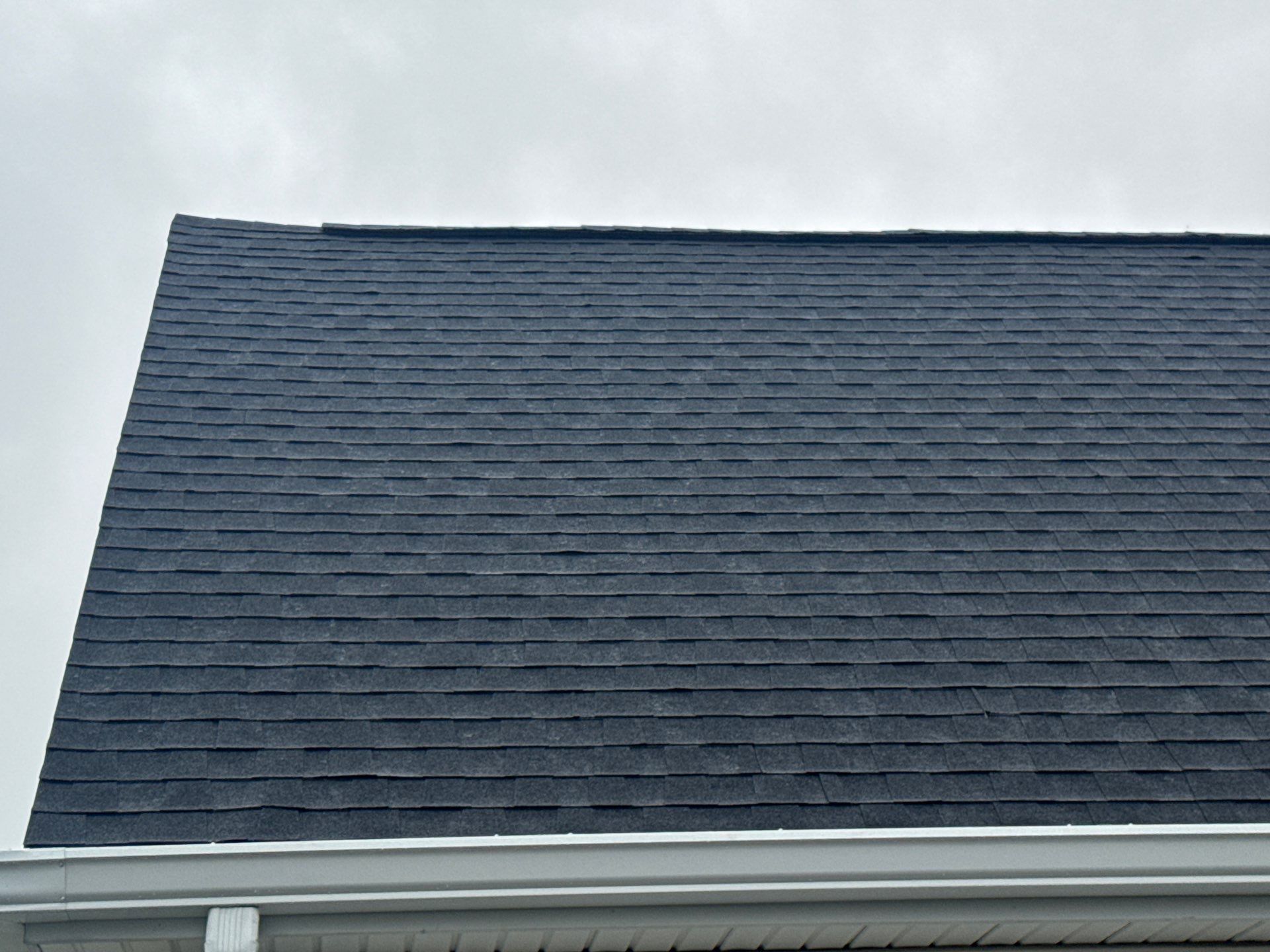 Residential Roofing Installation using GAF Timberline HDZ Charcoal by Rainstoppers Roofing