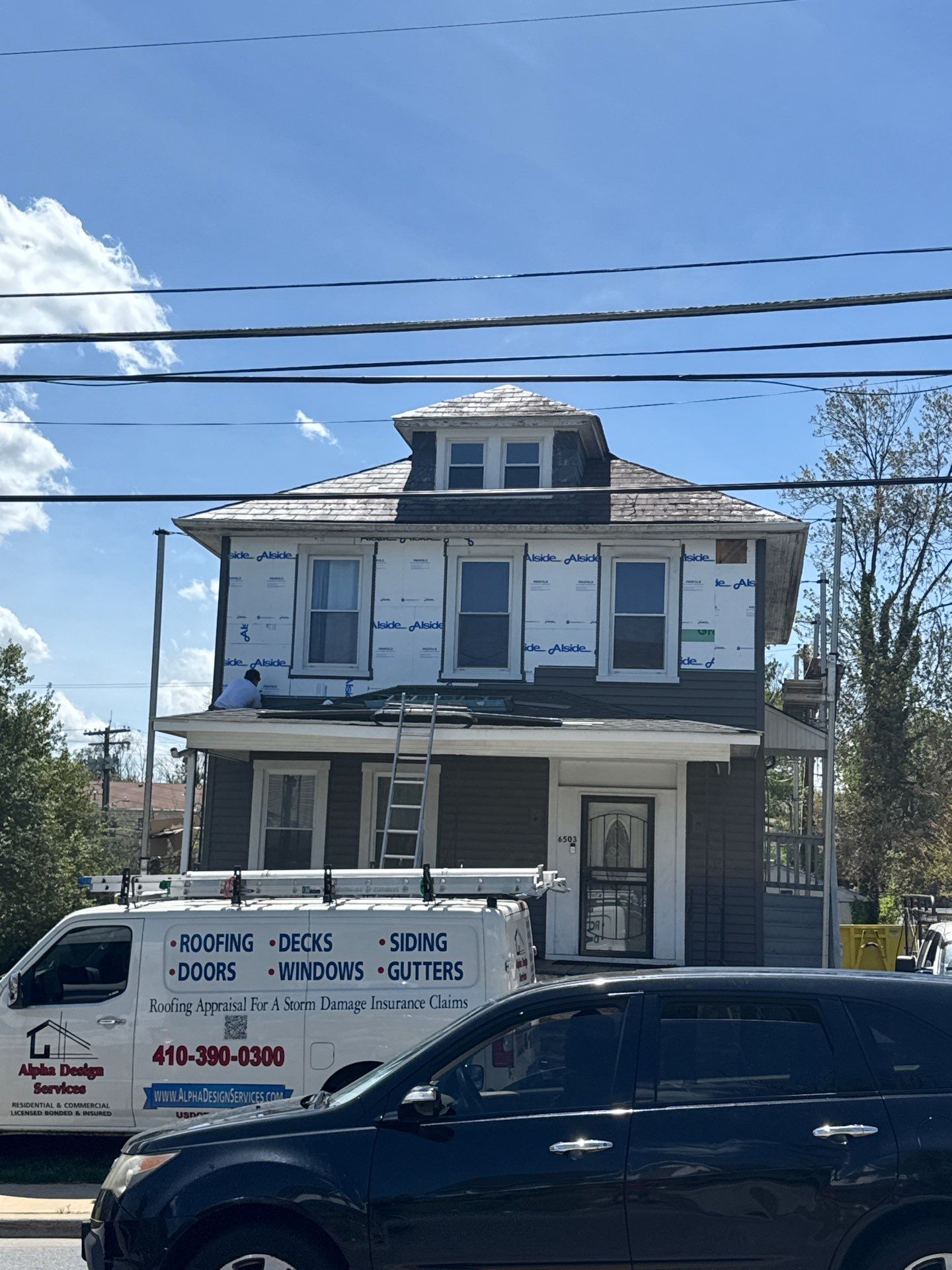 New siding & New Gutters by Alpha Design Services