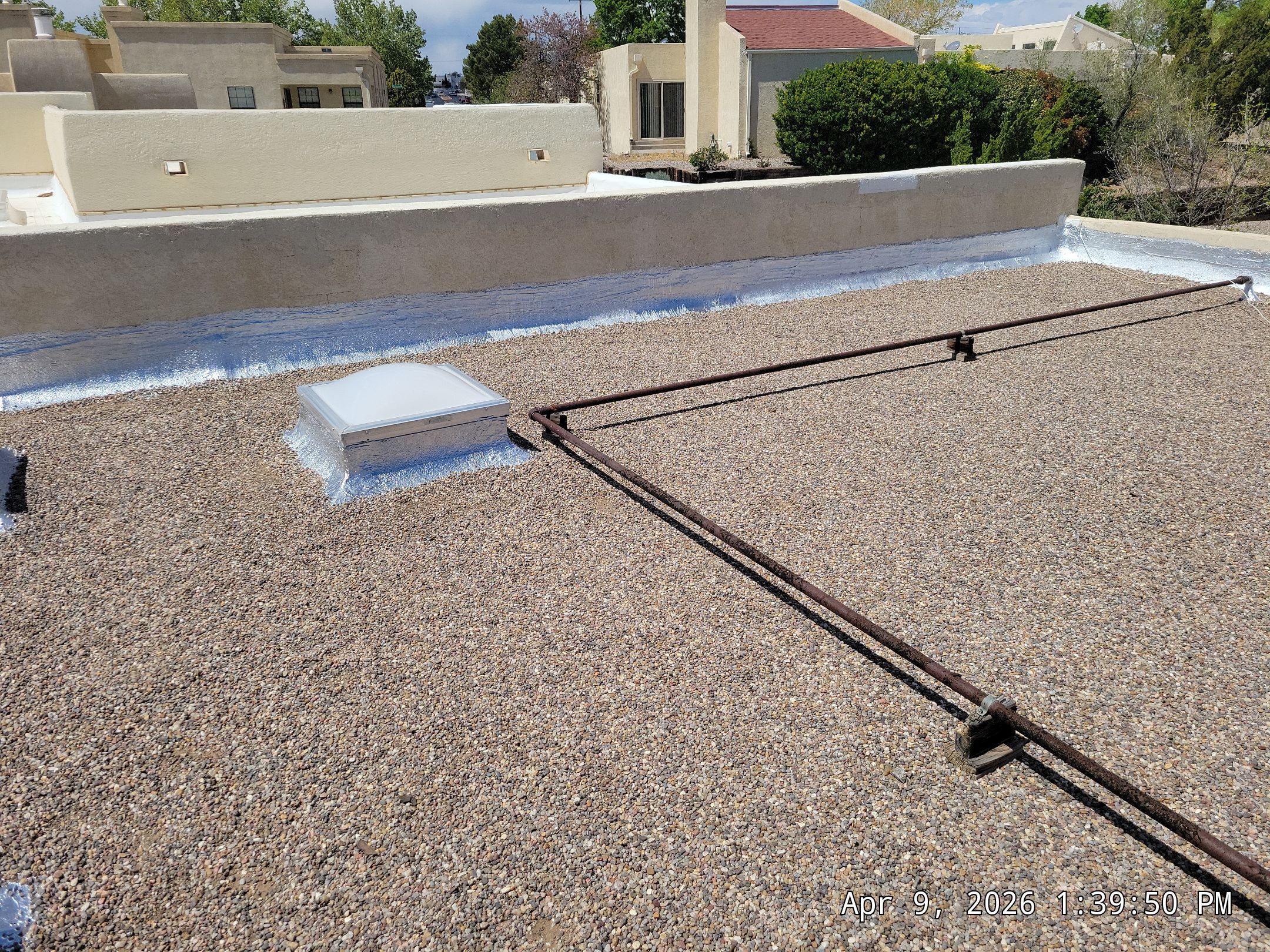 Tar and Gravel Roof Maintenance and Skylight Sealing in Rio Rancho by Doyle Roof Masters Inc