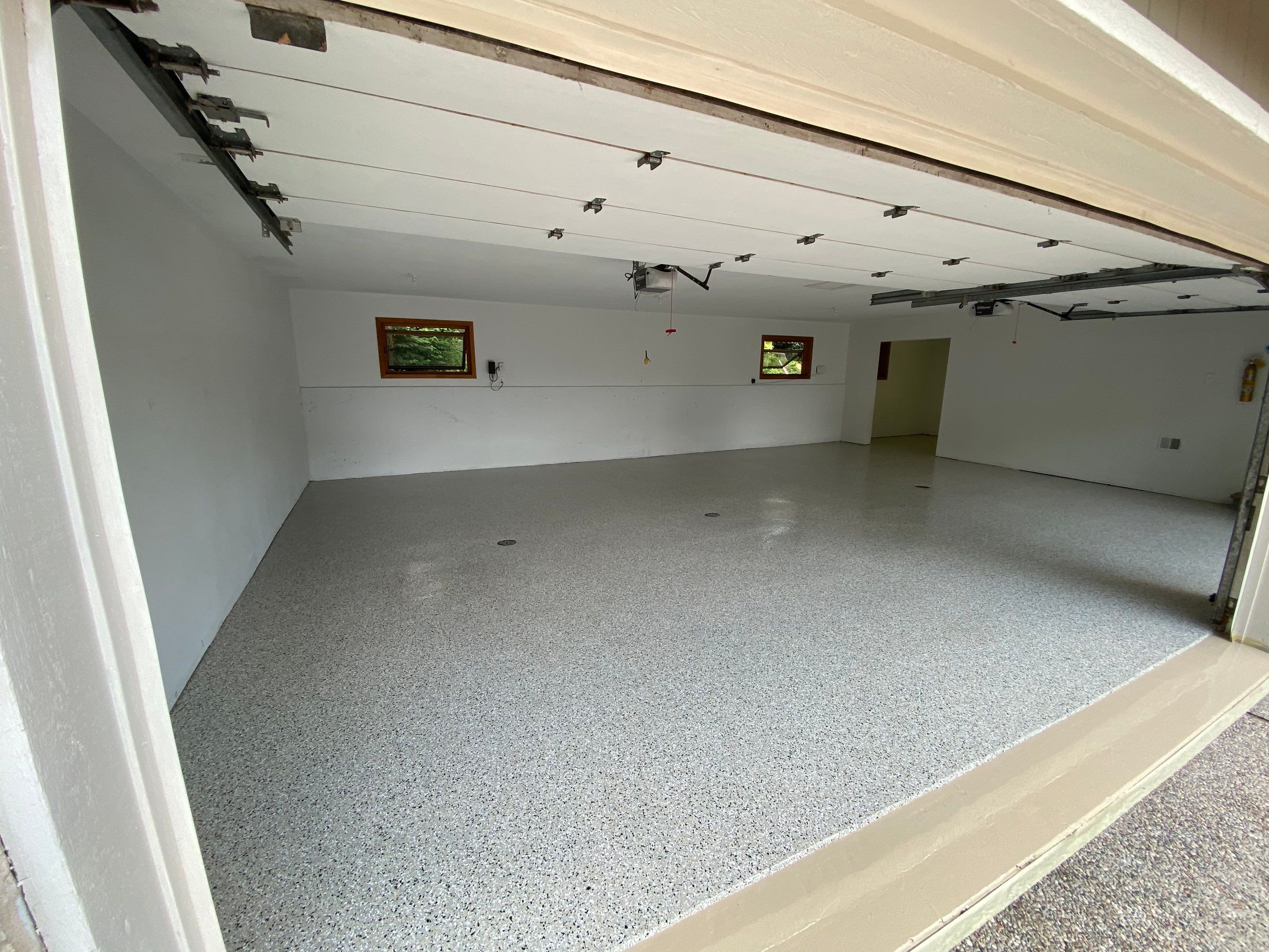 Briarcliff Northland -- Epoxy Garage Before and After by Big Red Decorative Concrete, LLC