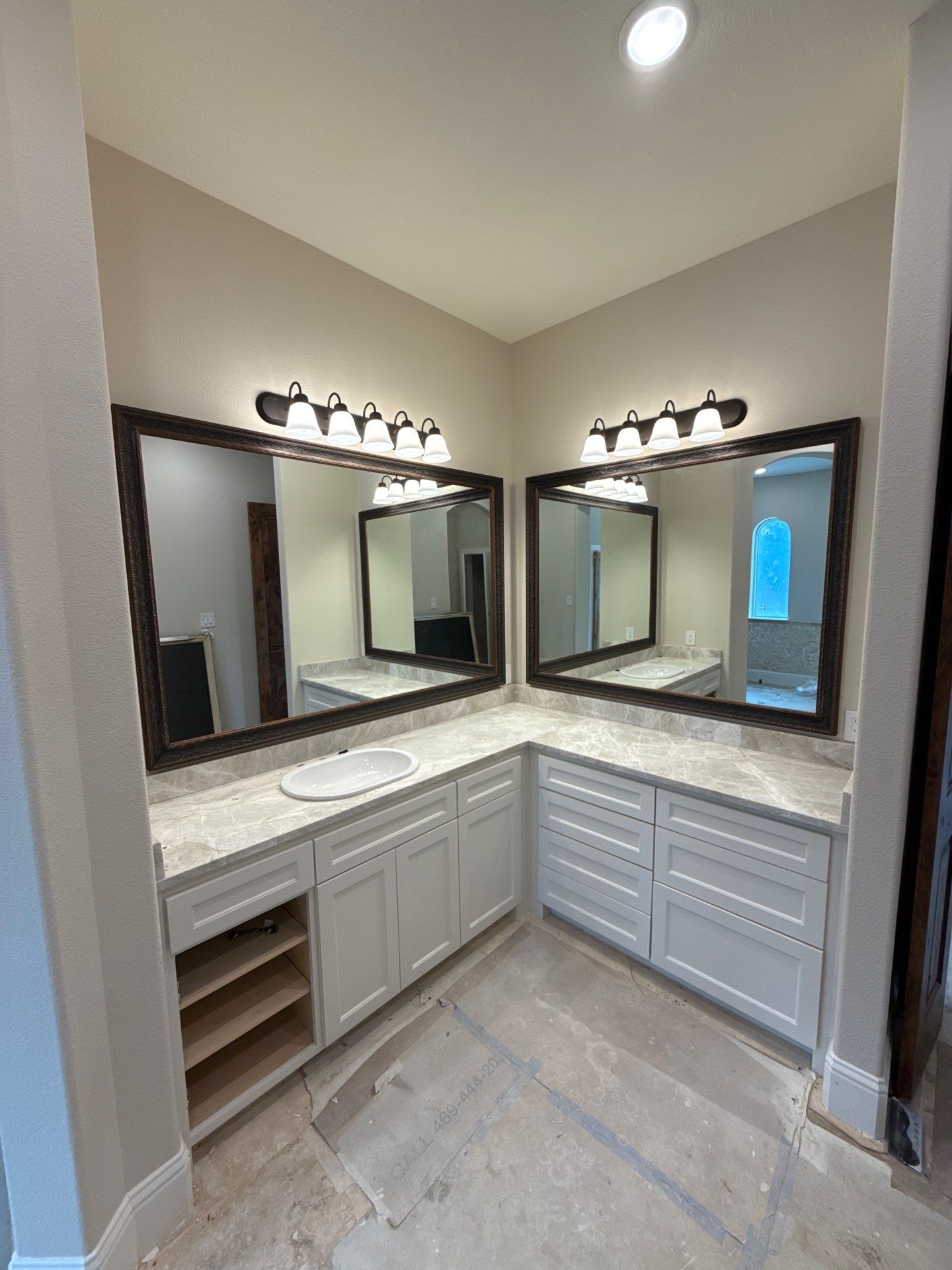 Frameless Rain Glass shower and Framed Mirror Project  by Richardson Glass & Mirror