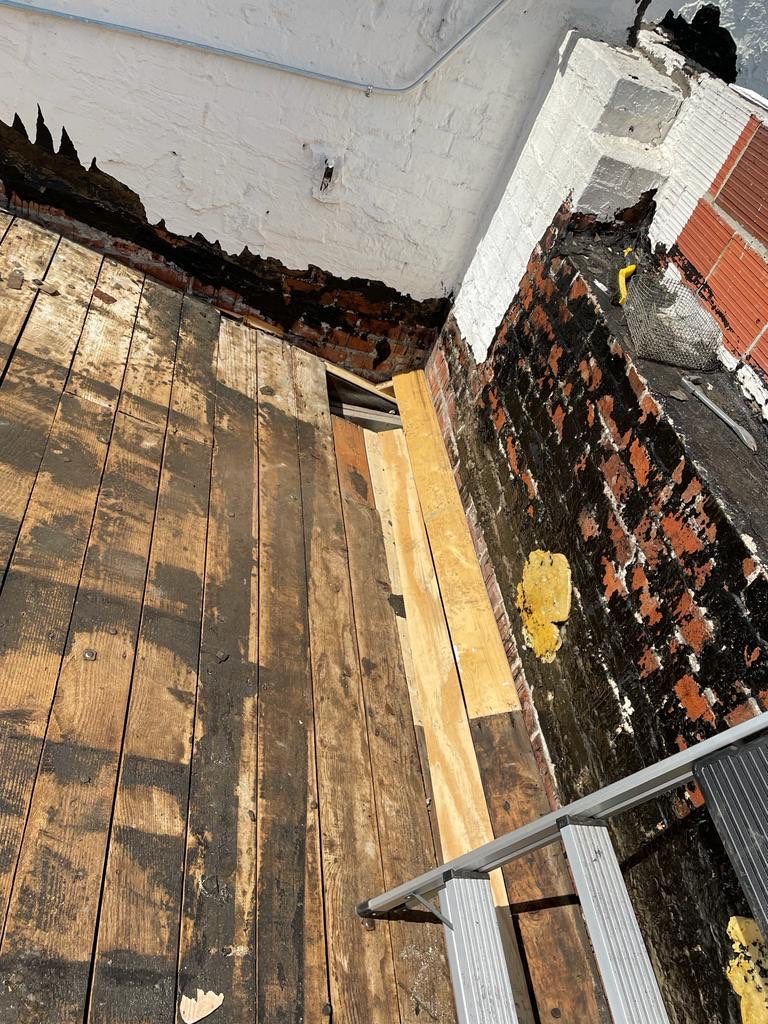 Commercial Roofing Installation using Conklin BenchPly system with PUMA top coat (imbedded fabric system) by Straight Edge Roofing Inc