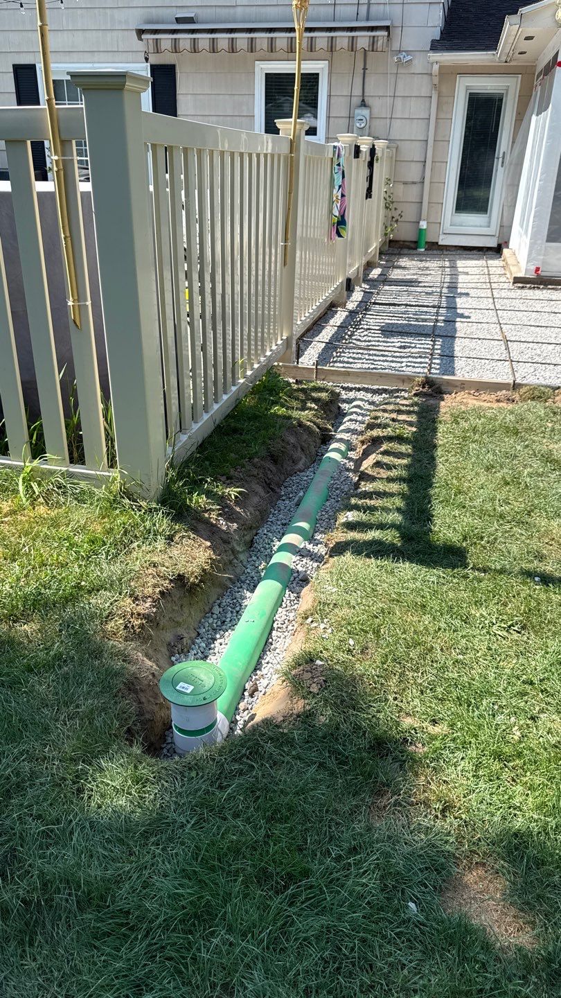 Broom finished concrete patio and sidewalk  by NG Masonry & Construction LLC