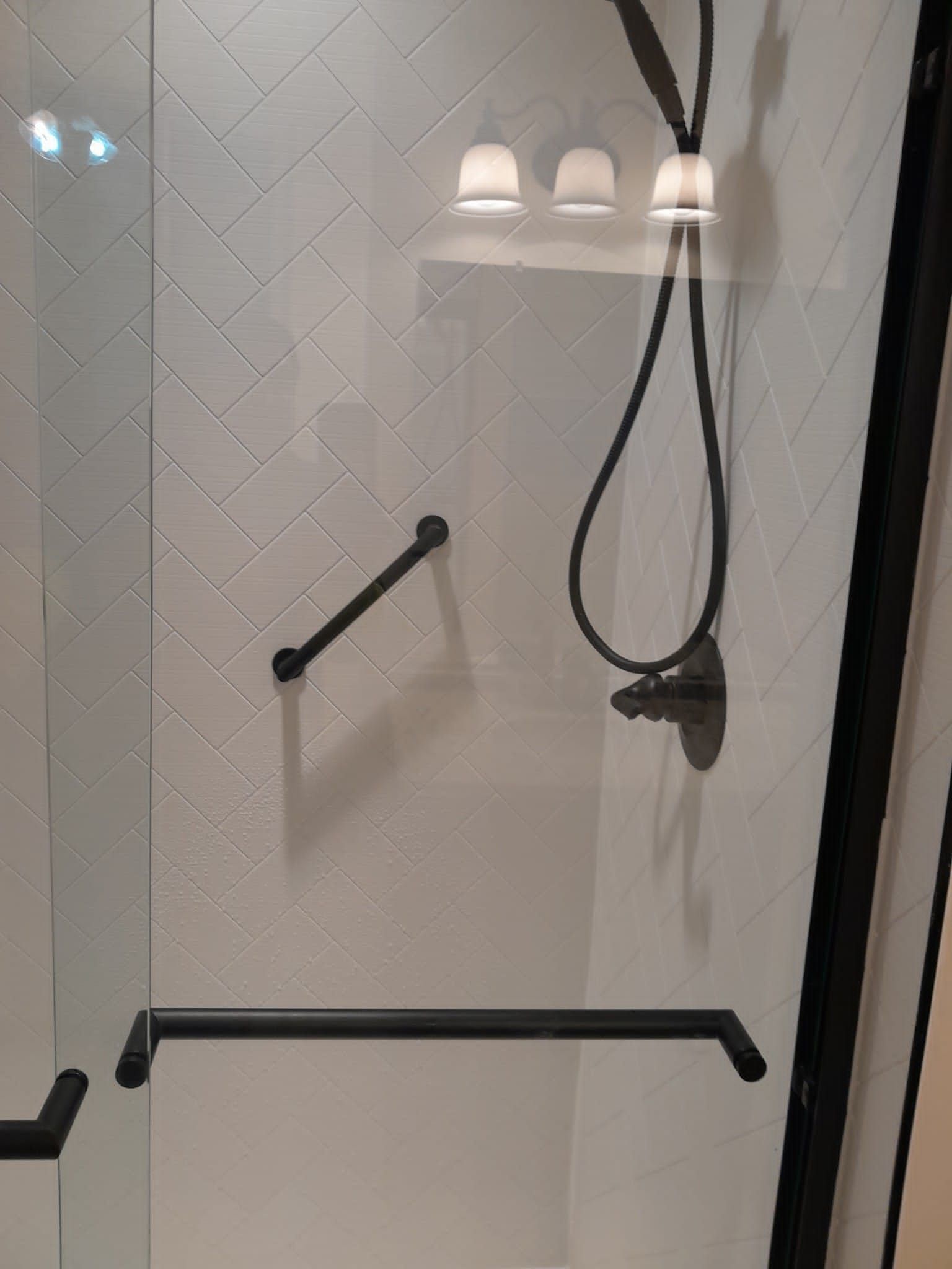 Shower remodel using Maintenance free wall system and shower pan with glass door by Window Depot of Annapolis