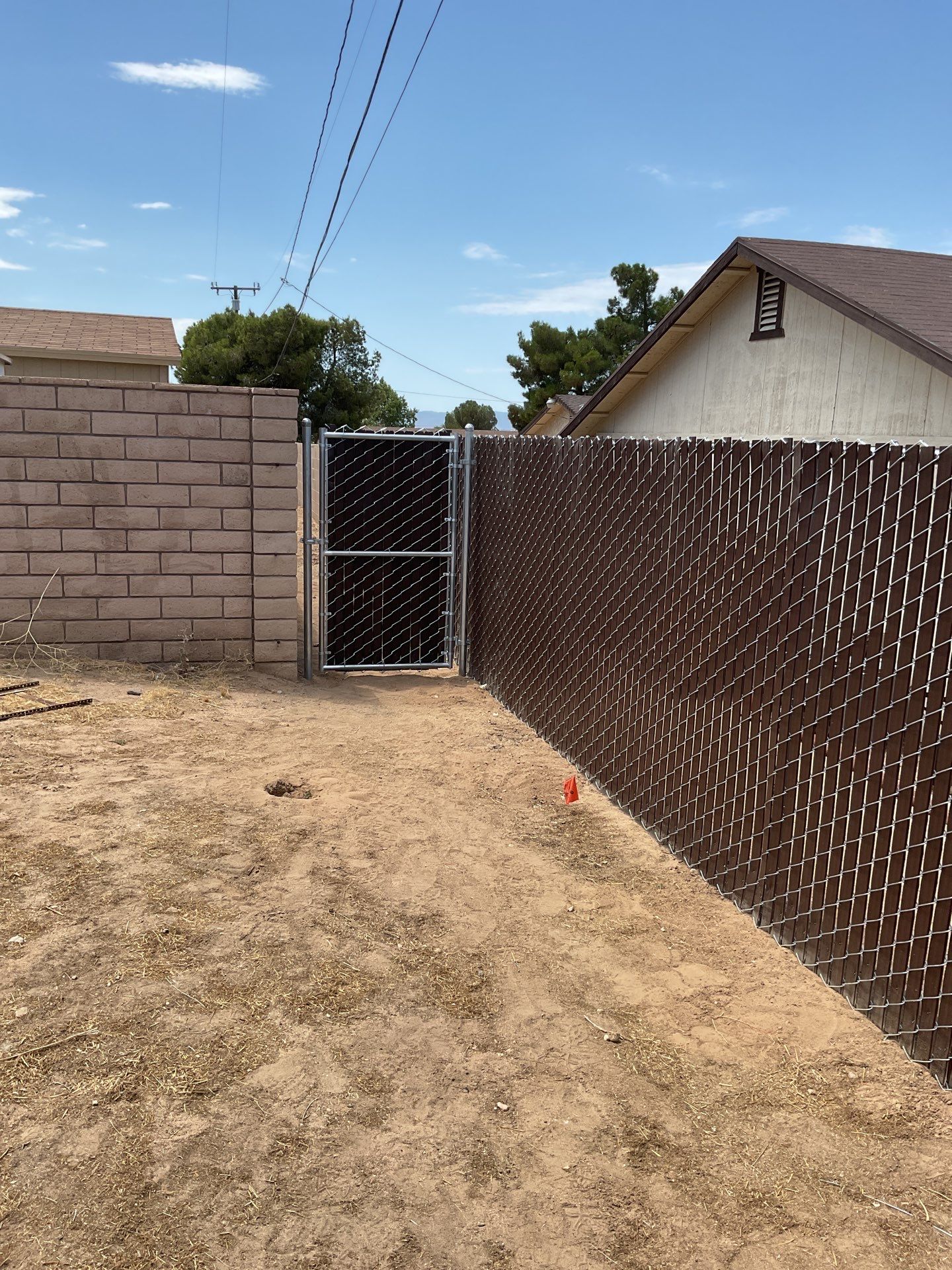 Dark Brown Privacy Chain Link Fence by Fence Guys Inc.