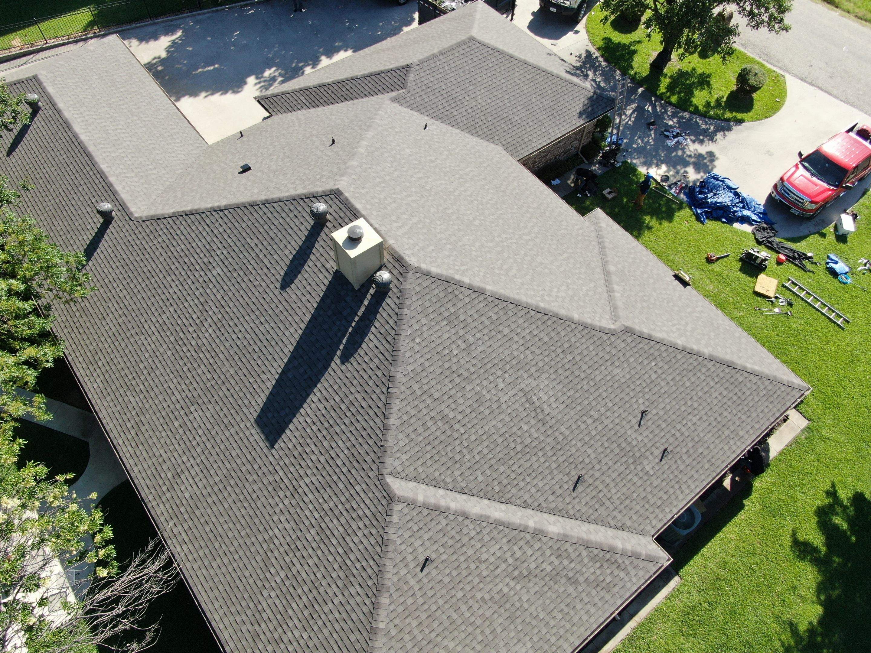 Full Architectural Shingle Roof Replacement and Chimney Repair in Runaway Bay by Armor Roofing | Exteriors