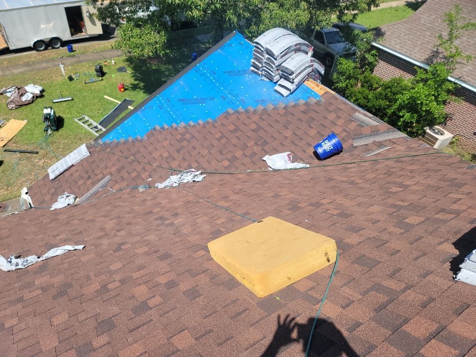 Residential Roofing Installation using Roof Replacement by American Roofing & Construction LLC