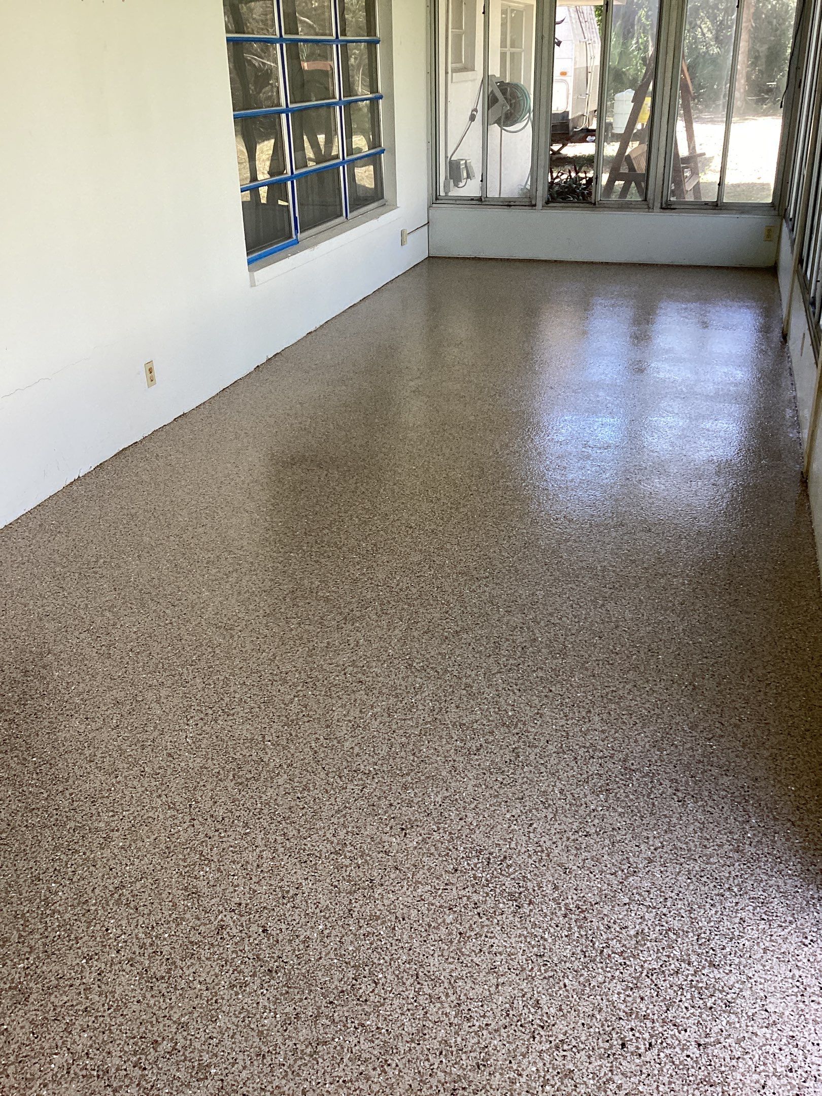Patio using Pebble Beach by Amvet concrete coatings llc