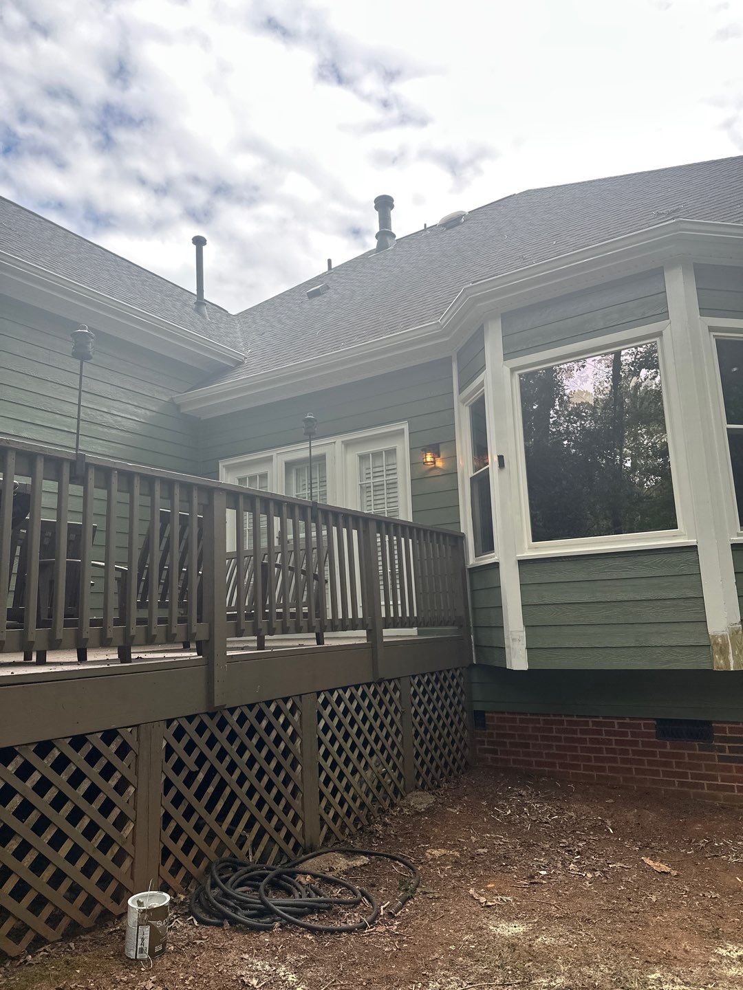 Raleigh Siding and Window Replacement with Custom Green Finish by The Remodeling Company