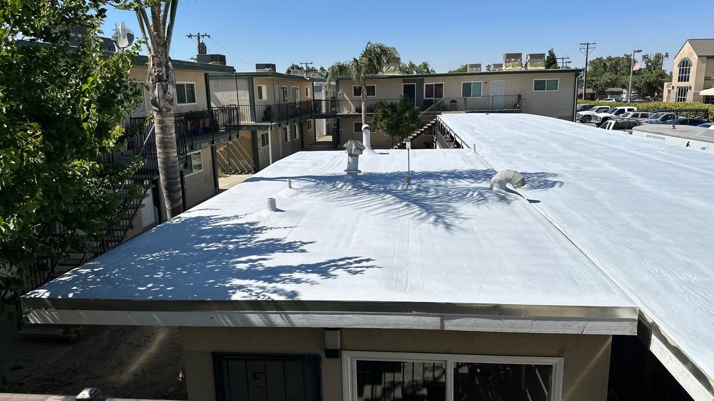 Foam Refurbish using General Coatings acrylic coatings and spray foam by Straight Edge Roofing Inc