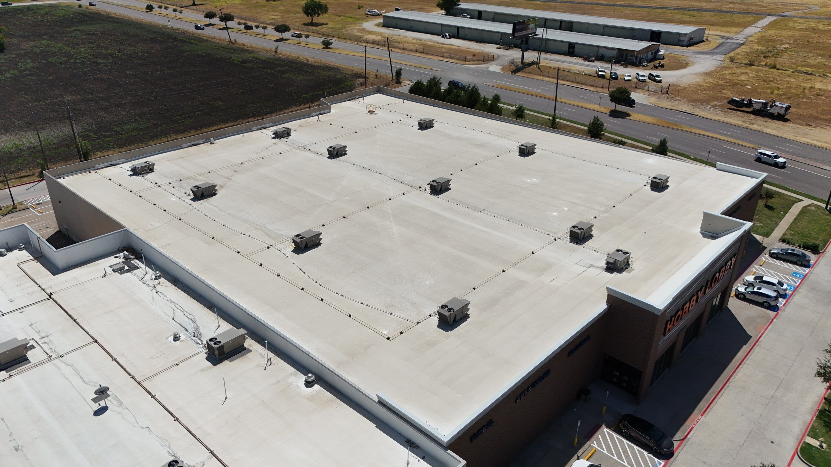Commercial Flat Roof Repair and Safety Guardrail Installation in Plano by Armor Roofing | Exteriors