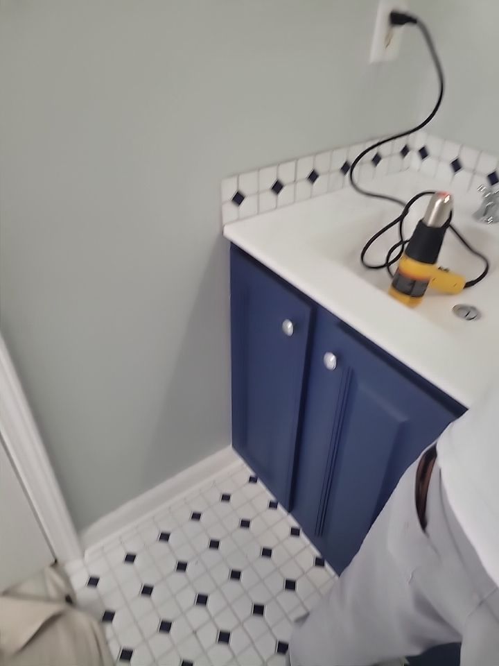 Cozy, Modernized Bathroom Retreat in Cary by Elite Remodeling and Design LLC