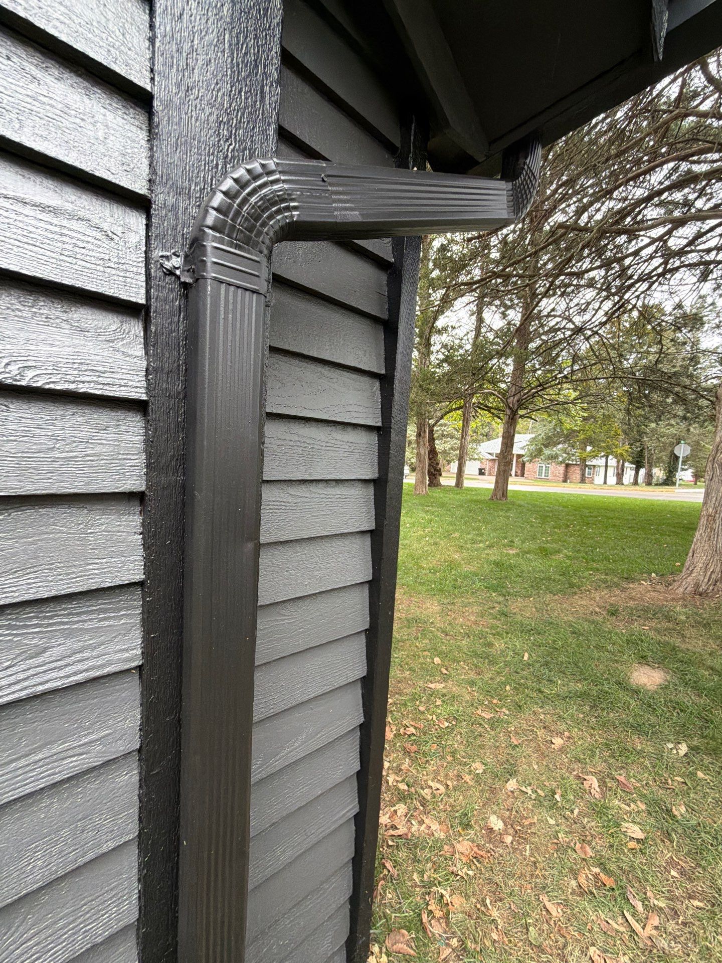 Wood siding refresh by Pezley Painting