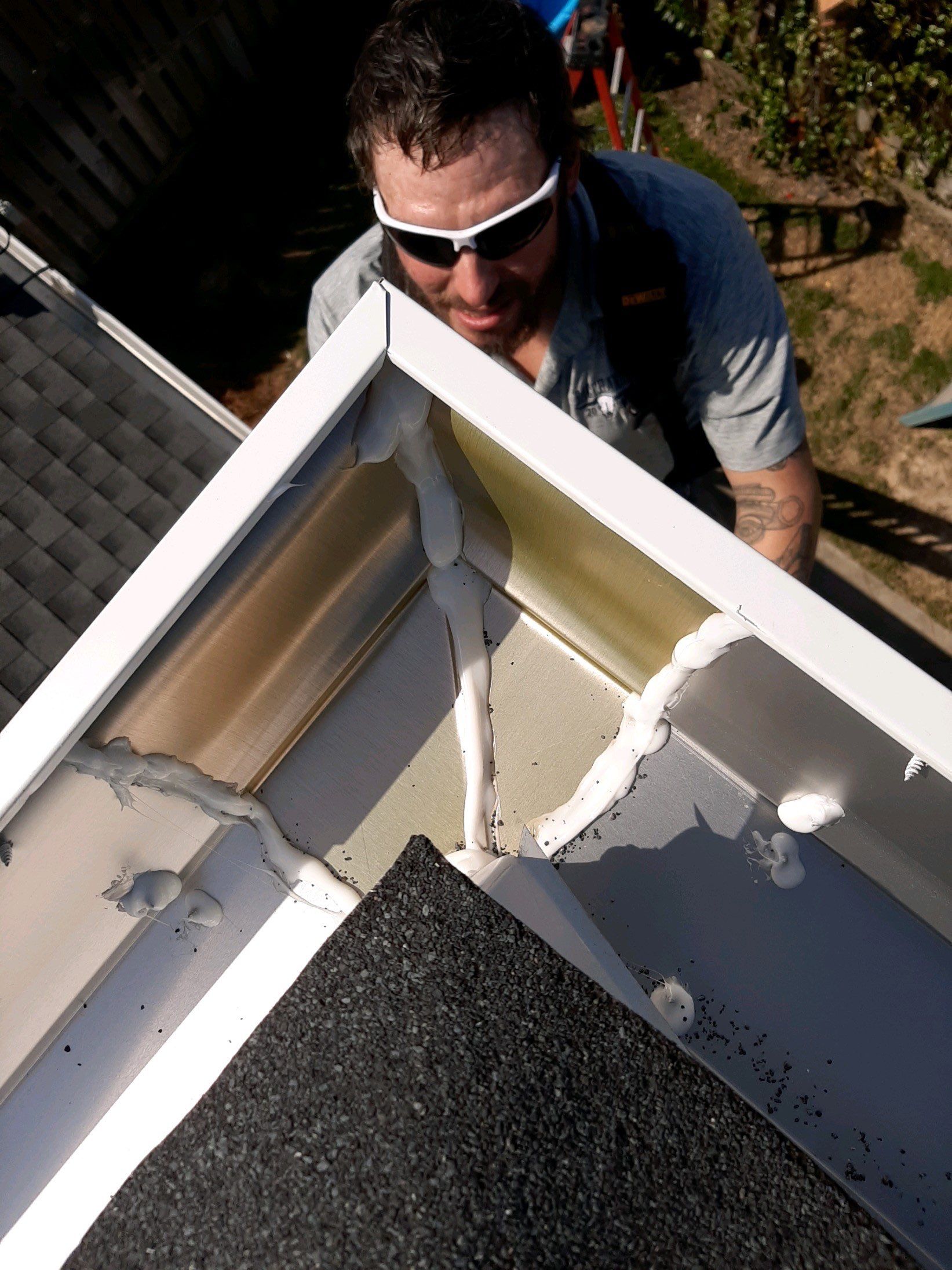 Gutter Installation Using White K-Style 6 Inch Seamless Gutters by Gutter Professors