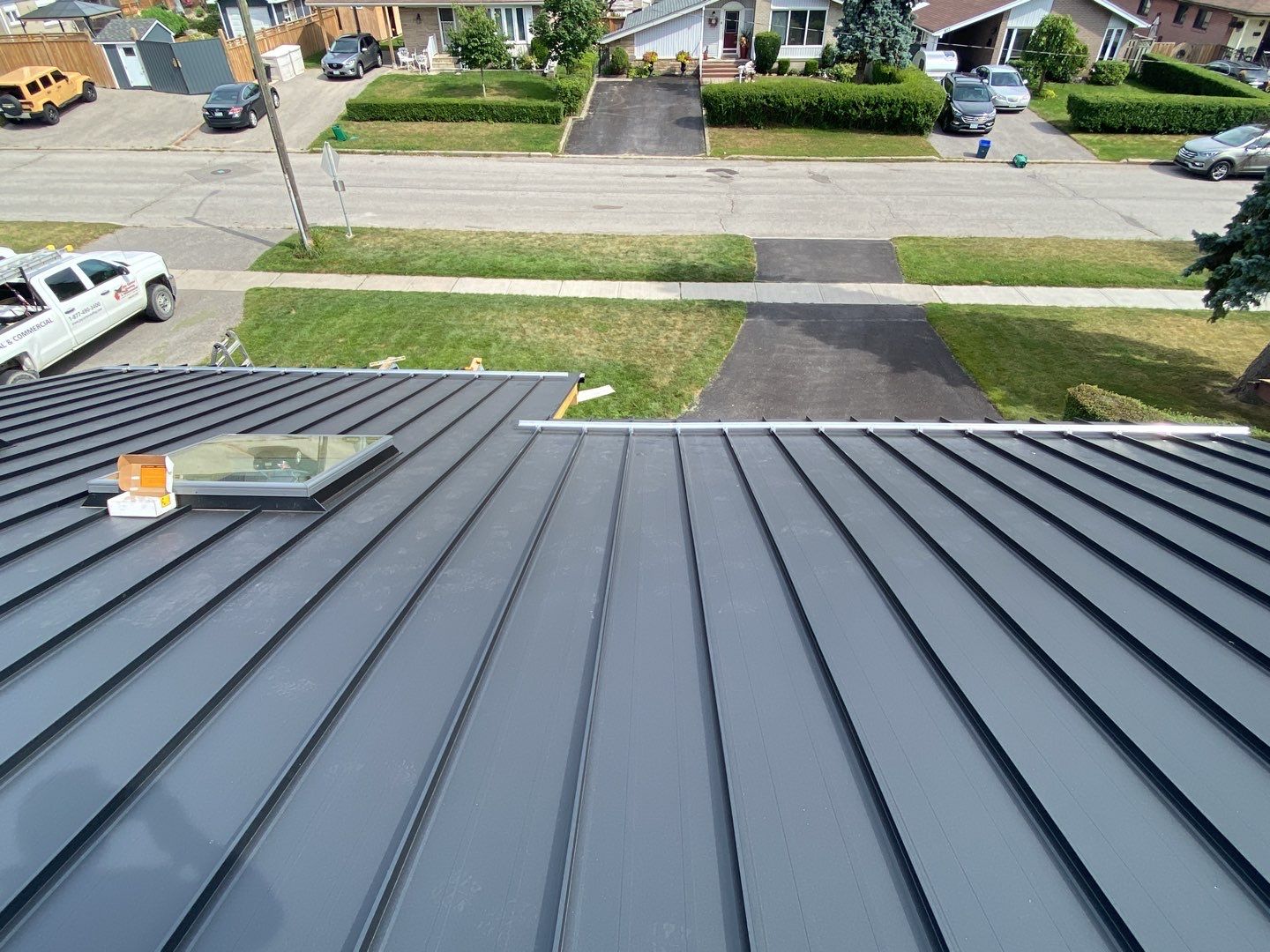 Residential Roofing Installation using 16" Standing Seam Panels by Jay Carter Roofing & Sheet Metal