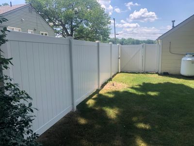New Vinyl Privacy Fence with matching Gate in white.