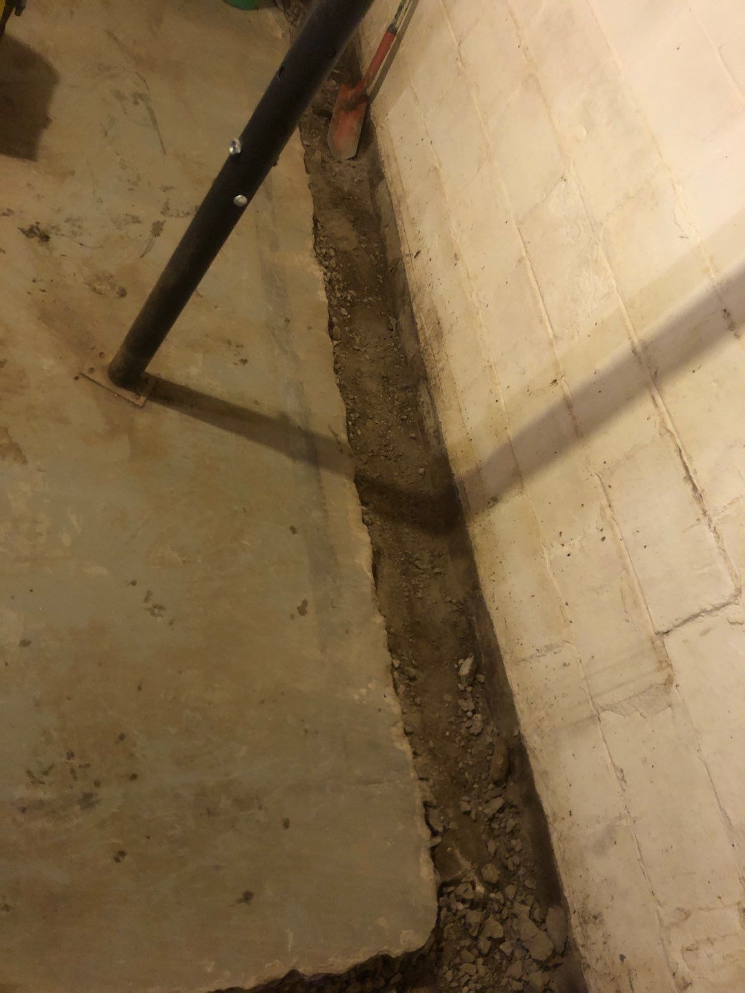 Basement Waterproofing using Drain tile system and a foundation wrap by ACE Waterproofing & Basement Solutions