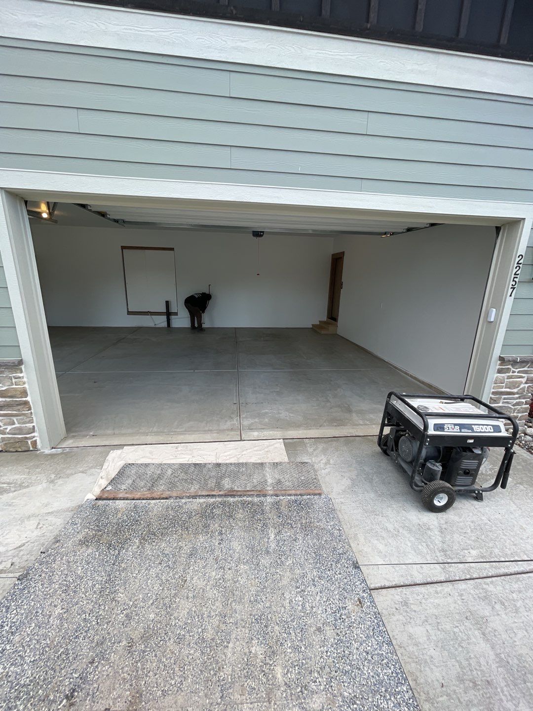 Garage Transformation using Pebble Beach by Croc Coatings, LLC