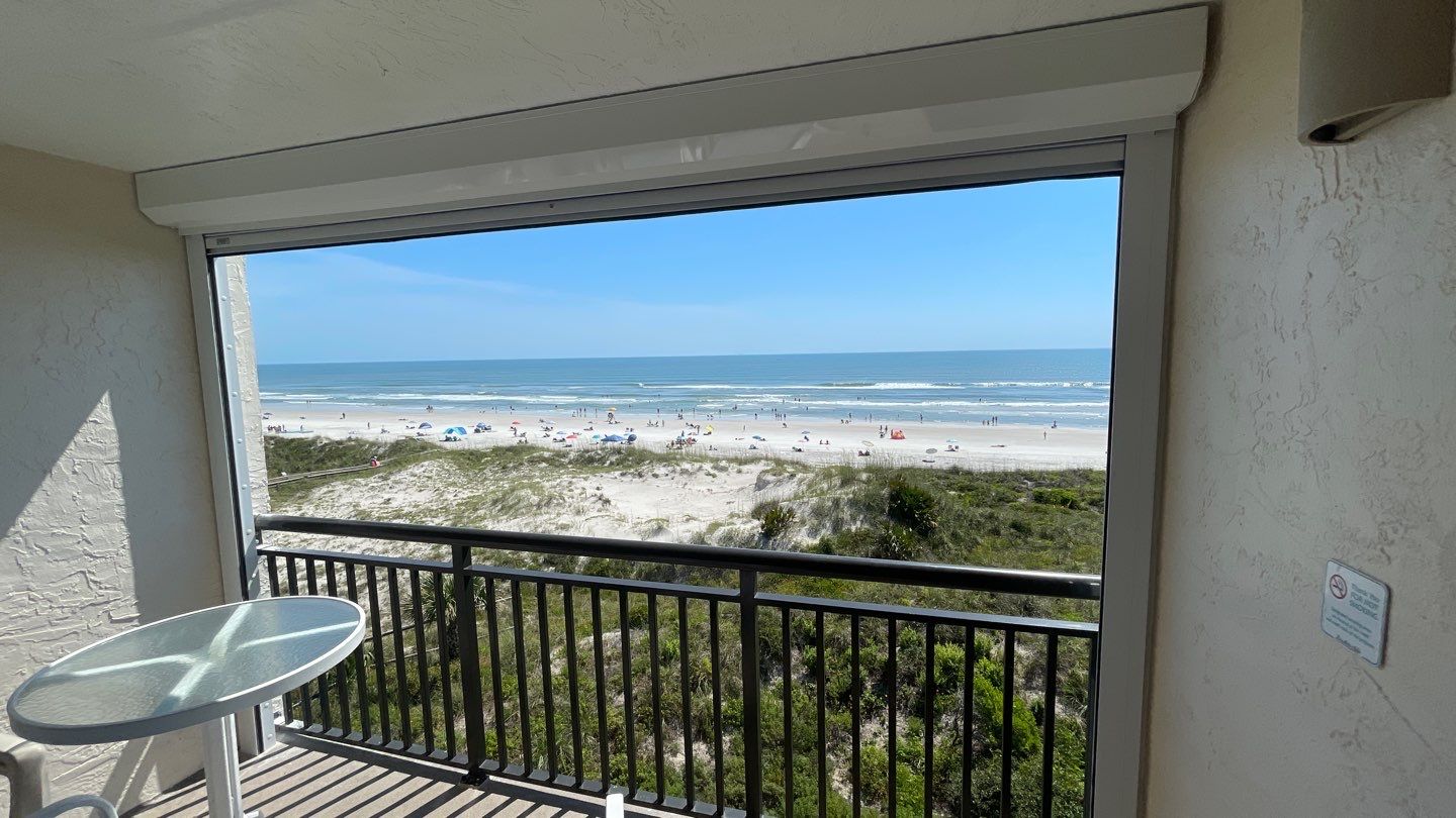Rolling Shutter on condo balcony  by Smart Guard Shutters