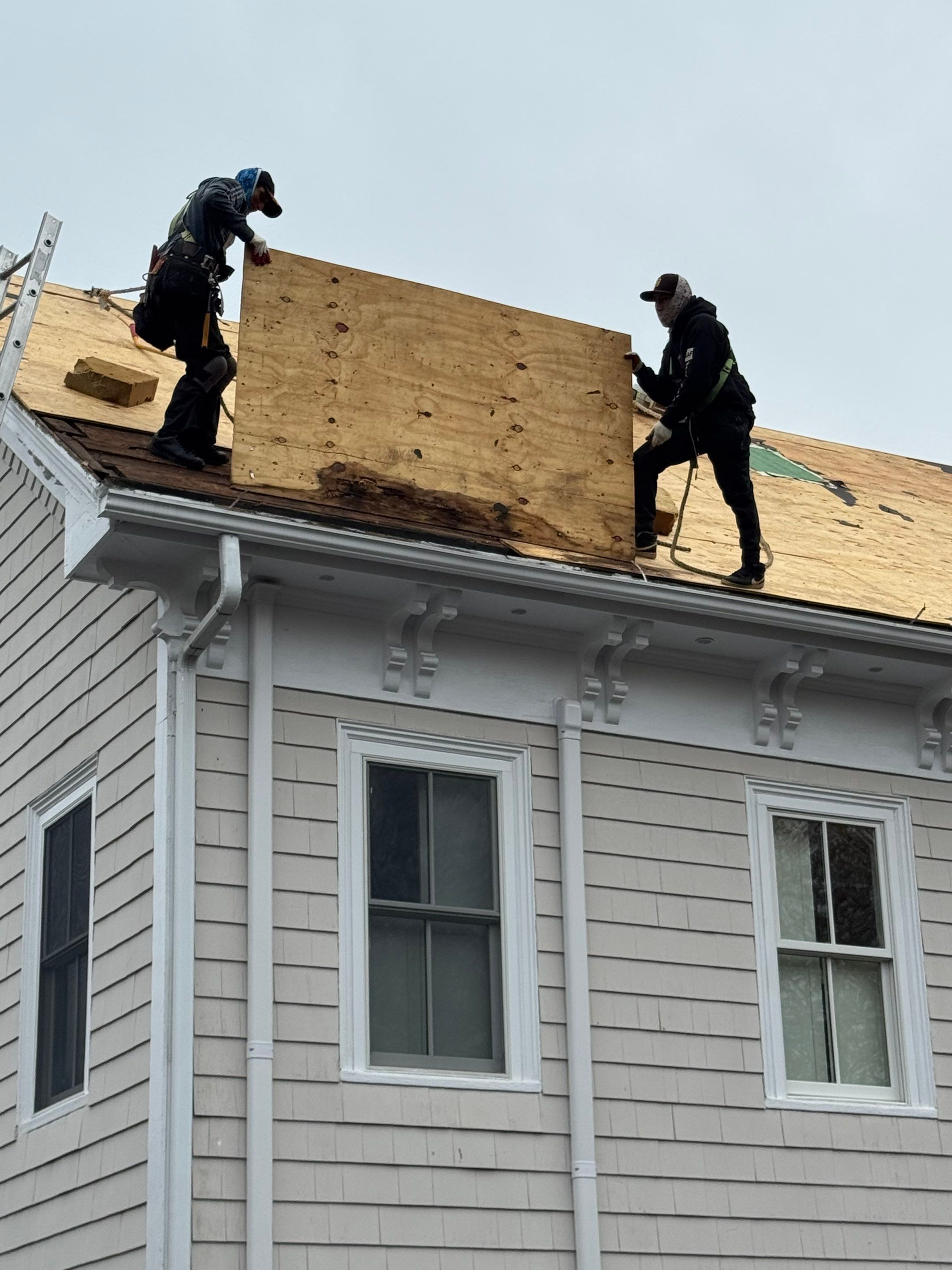 Newburyport Complete Roof Replacement with Solar Venting Skylight by Mighty Dog Roofing of Greater Middlesex County
