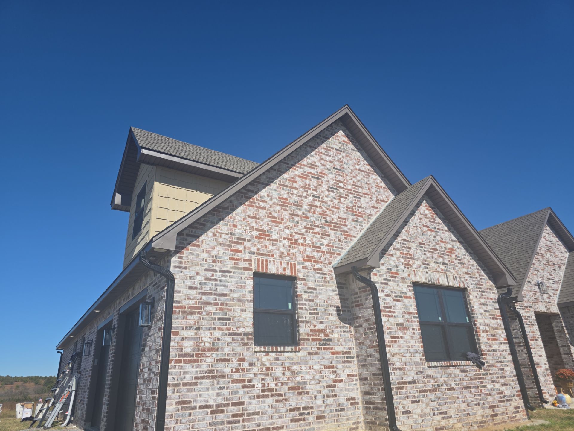 Fascia and door frames wrapped with PVC coil & soffit installation by In & Out Construction & Remodeling, LLC