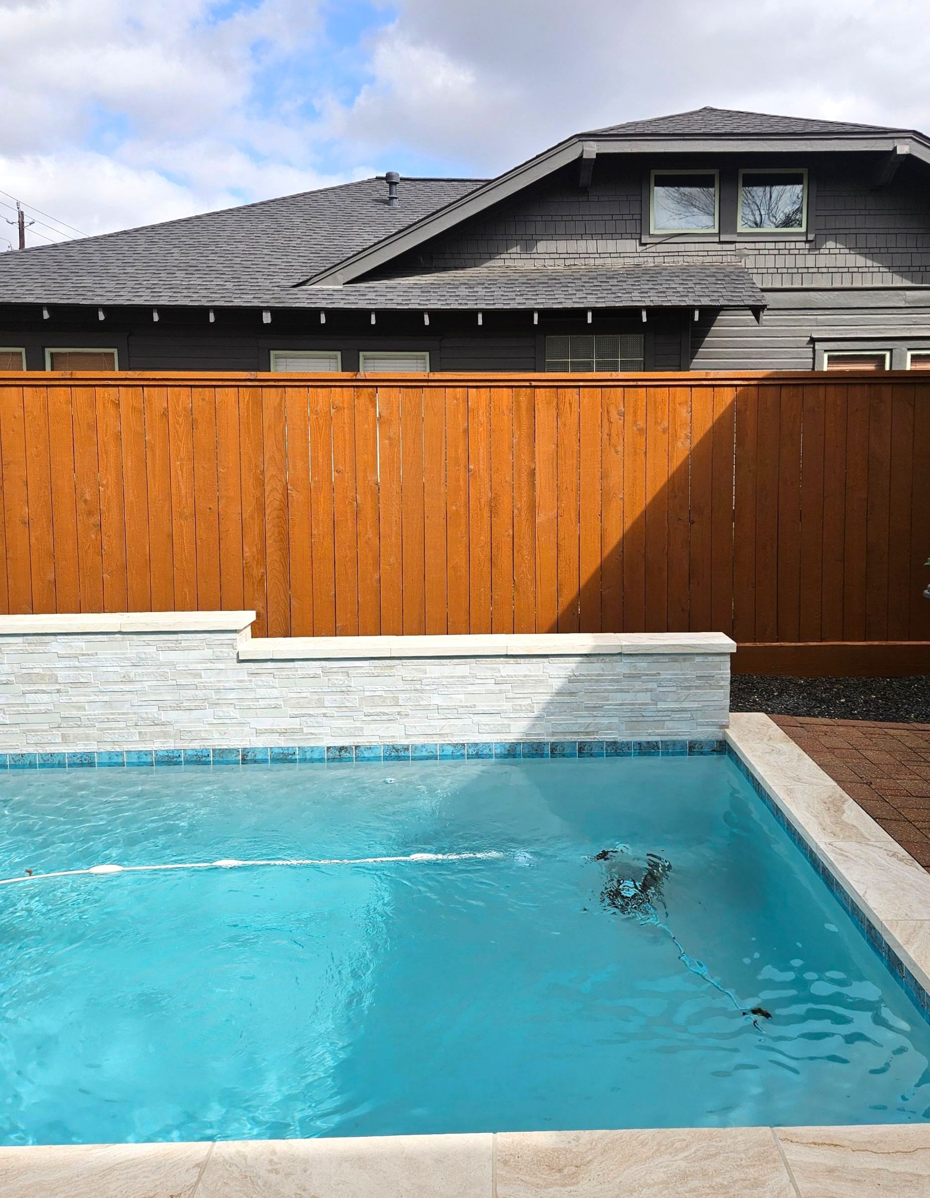 Durable Fence & Gate Installation with Premium Stain by Tim's Fences