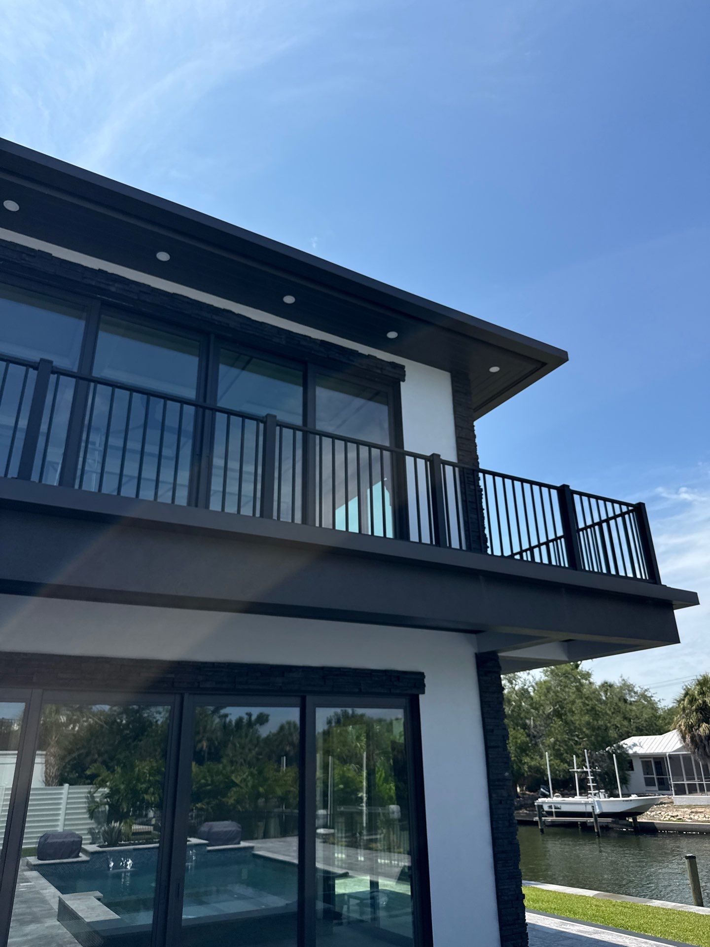 7-Inch Smooth Box Seamless Gutters using black seamless gutters in Siesta Key Fl by Gutter Professors