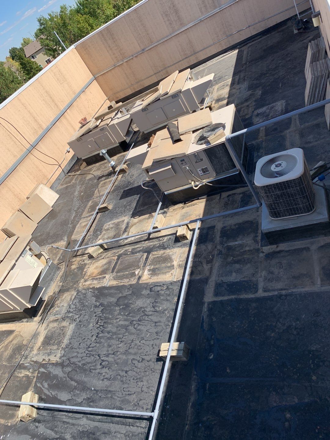 Commercial Roofing Installation using American Standard Coating - S  by A to Z Roofing