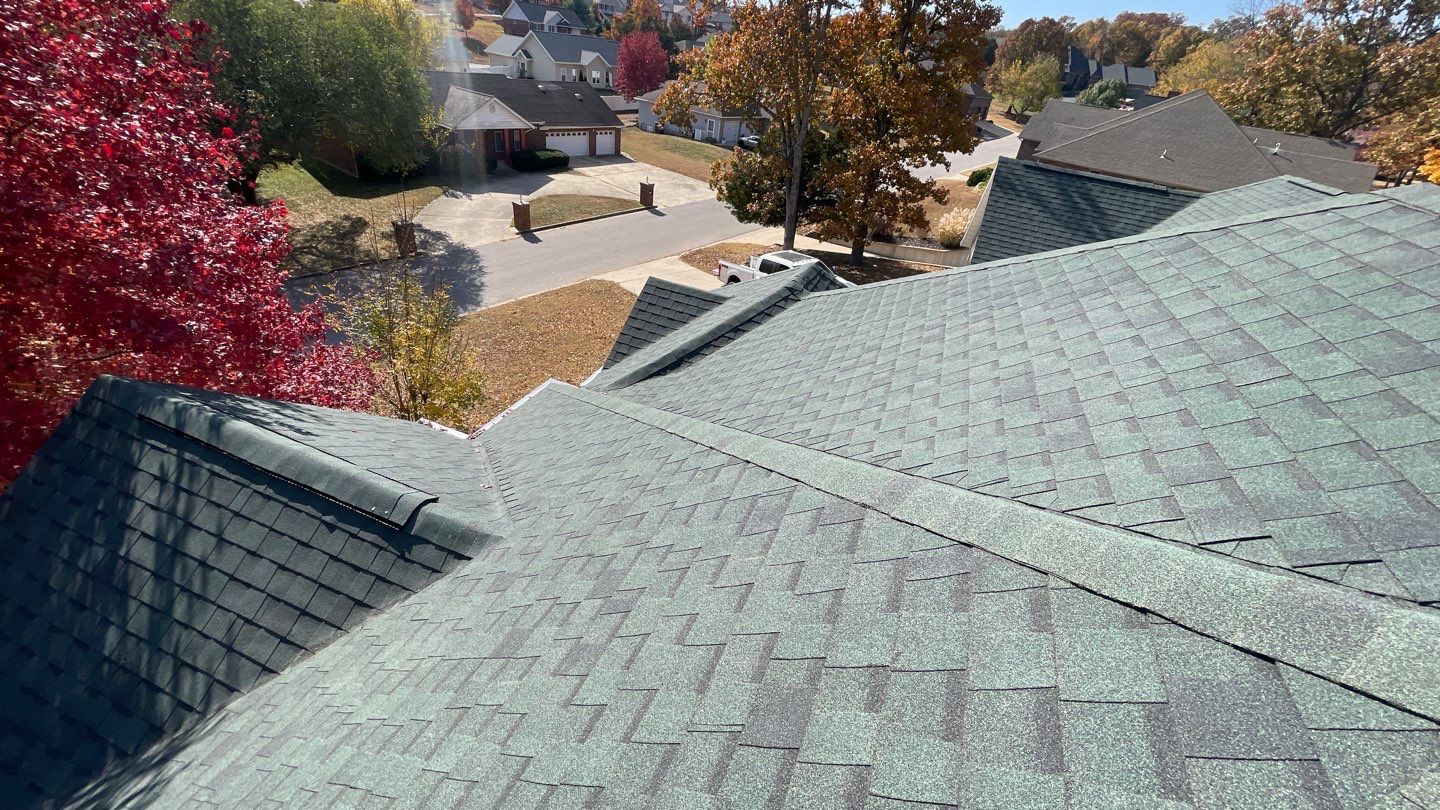 Residential Roofing Install - Green Atlas Pinnacle Pristine Shingles - White Gutters & Downspouts  by Titan Commercial & Residential Roofing 