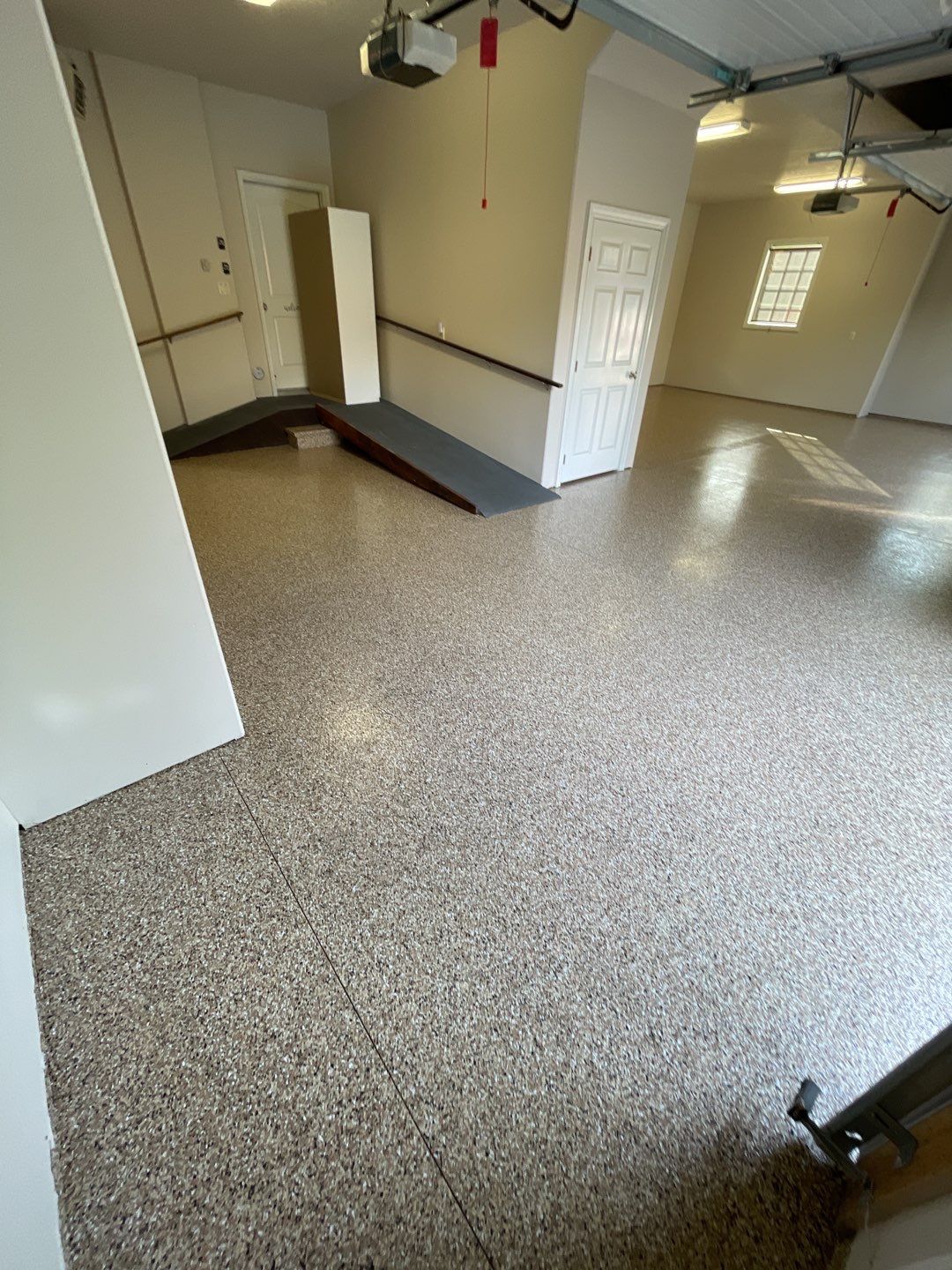 Garage Transformation using Sandstone by Croc Coatings, LLC