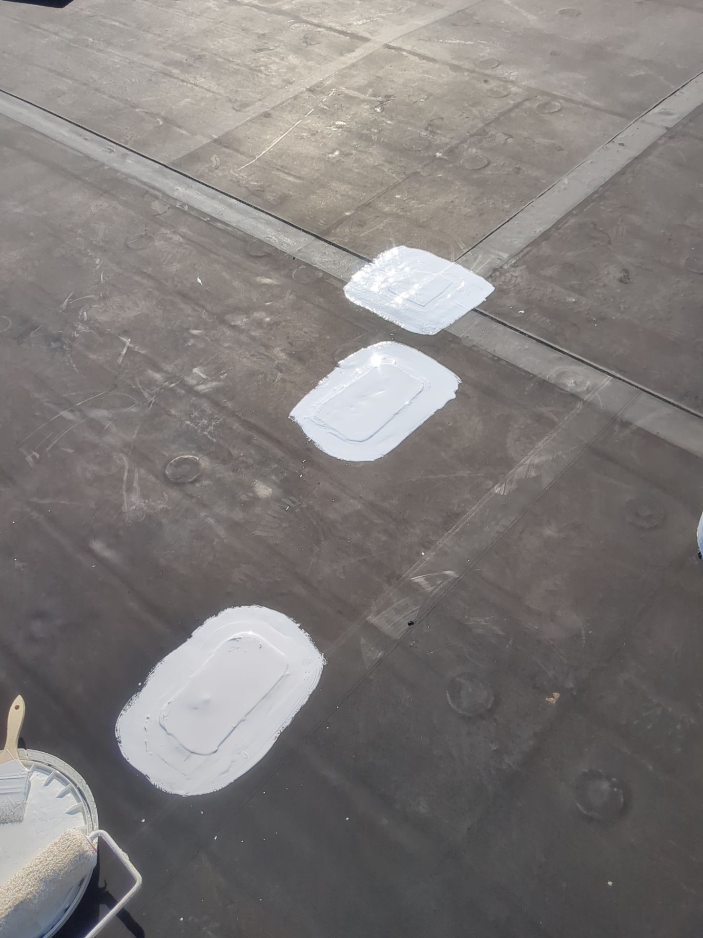 Commercial Roofing Repair using UniFlex Silicone Roof Coating on KinderCare Learning Center by 3 Daughters Construction 