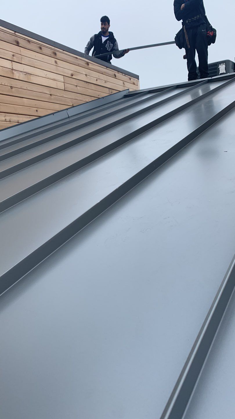 Apartment Roof Replacement by First Out Roofing 