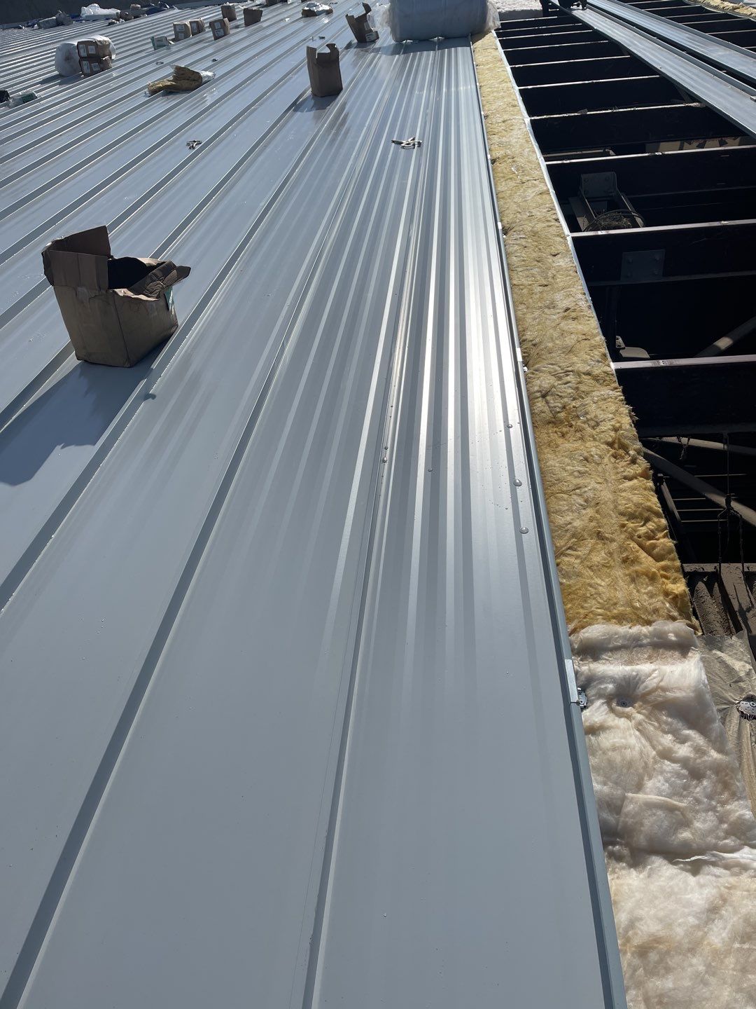 Commercial Roofing Installation using 24 Guage Double Lock Standing Seam by Legacy Roofing & Solar