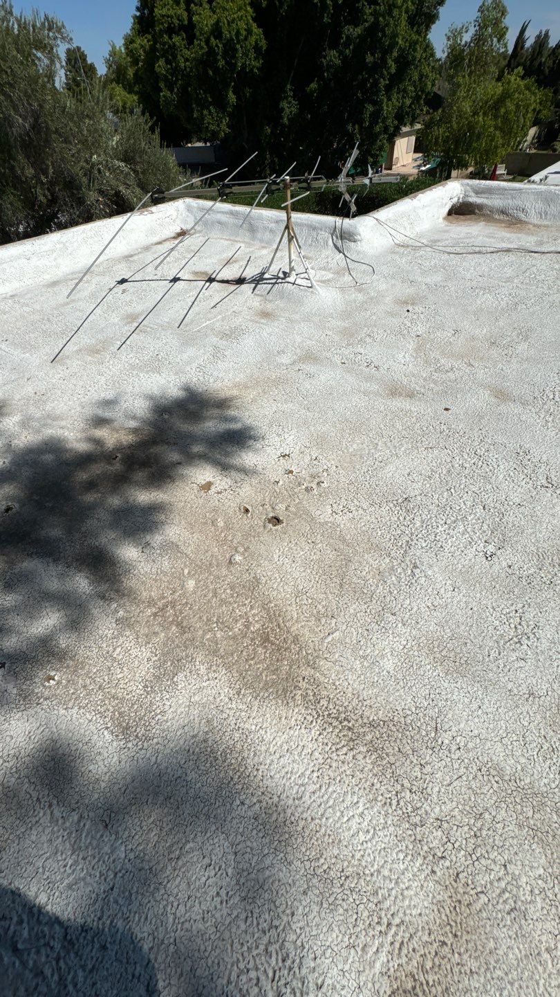 Re-coat & Tile Job by All Storm Roofing & Construction