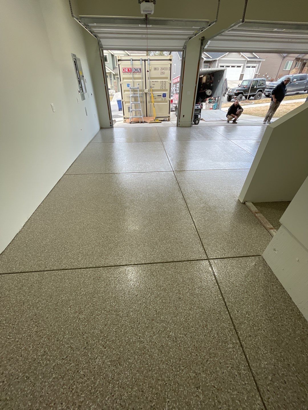 Garage Transformation using Pebble Beach by Croc Coatings, LLC