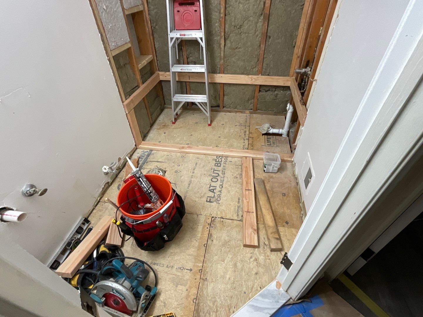 Bathroom Remodel using Two new bathroom design and new floors by Alpha Design Services