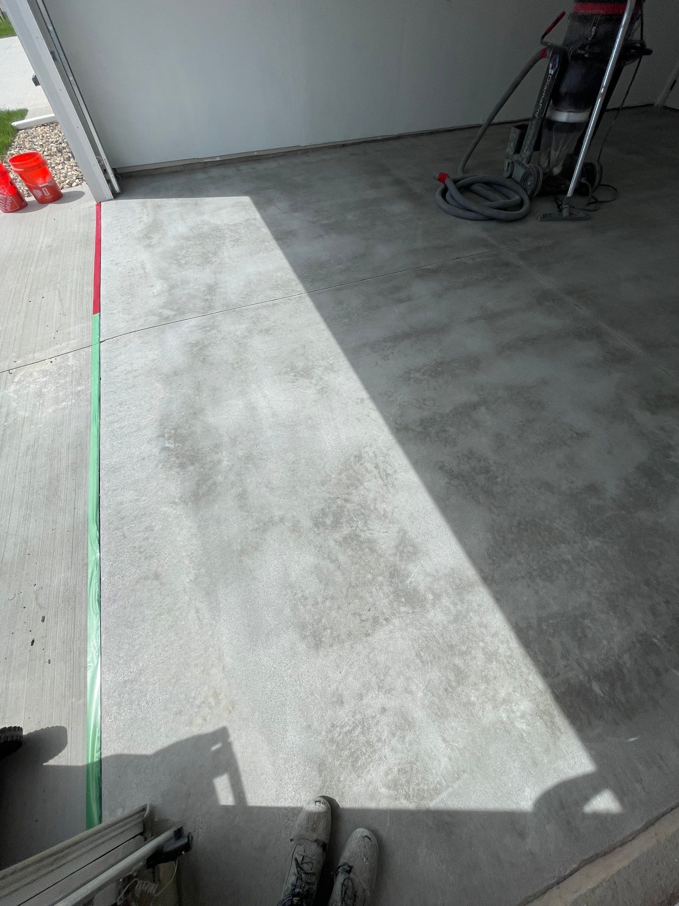 Sioux Falls Garage Floor Transformation with Cabin Fever Decorative Chips by Select Painting, Coatings & Garage Cabinets