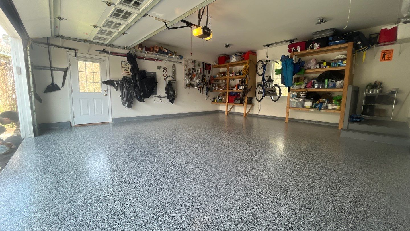 Garage in Londonderry, NH 03053 by Symphony Concrete Coatings