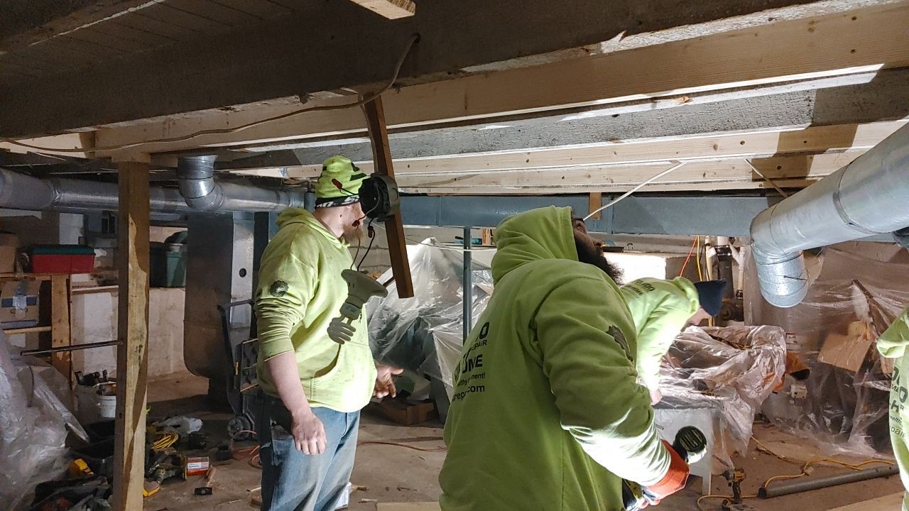 Structural Wood Reinforcement using Structural Wood and Steel Reinforcements (Main Floor Joist) by Toledo Basement Repair