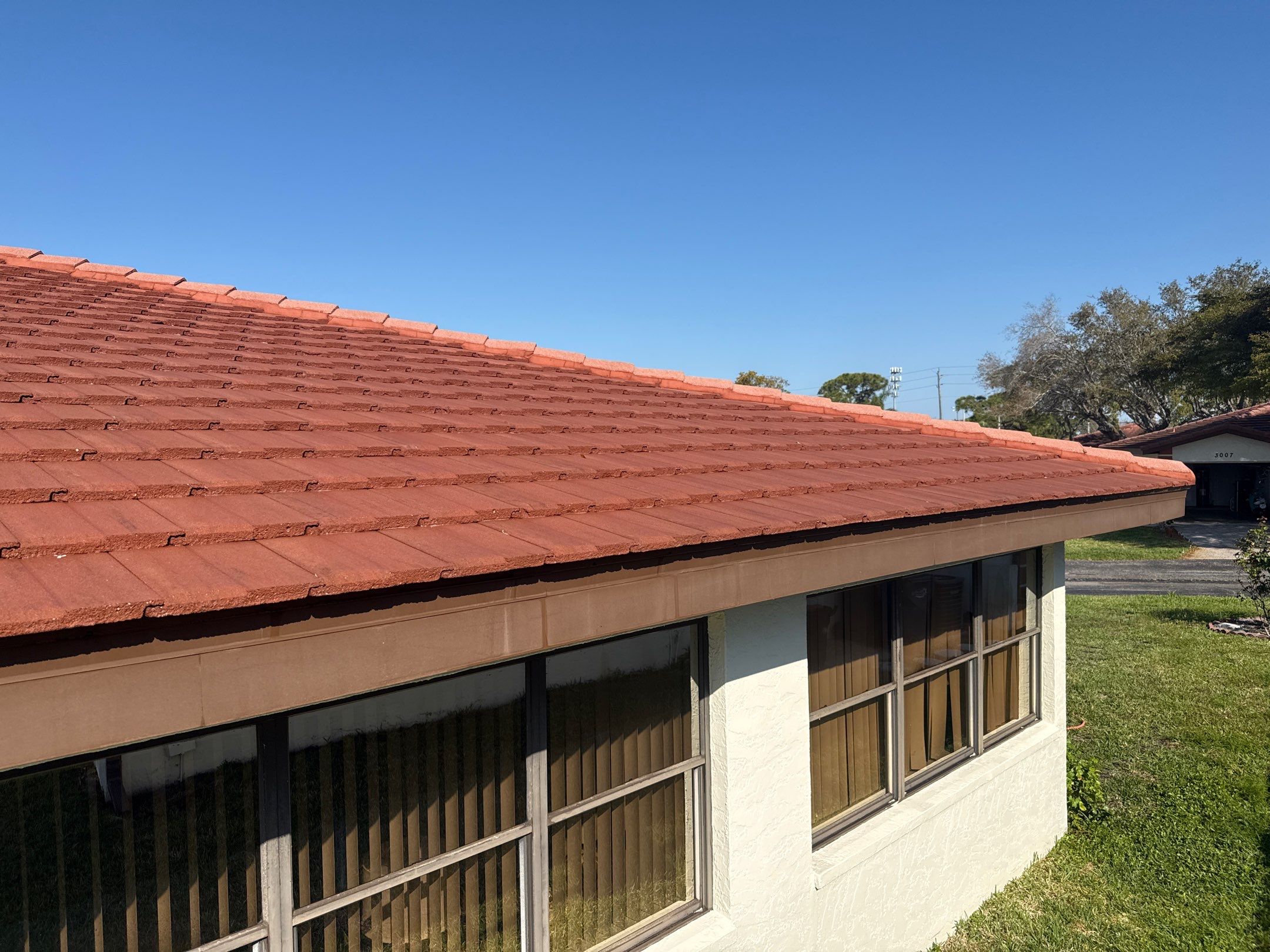 Tile Roof Cleaning – Vivenda at Bradenton I (5-Star Review & Plant Protection) by Sunshine AquaWash