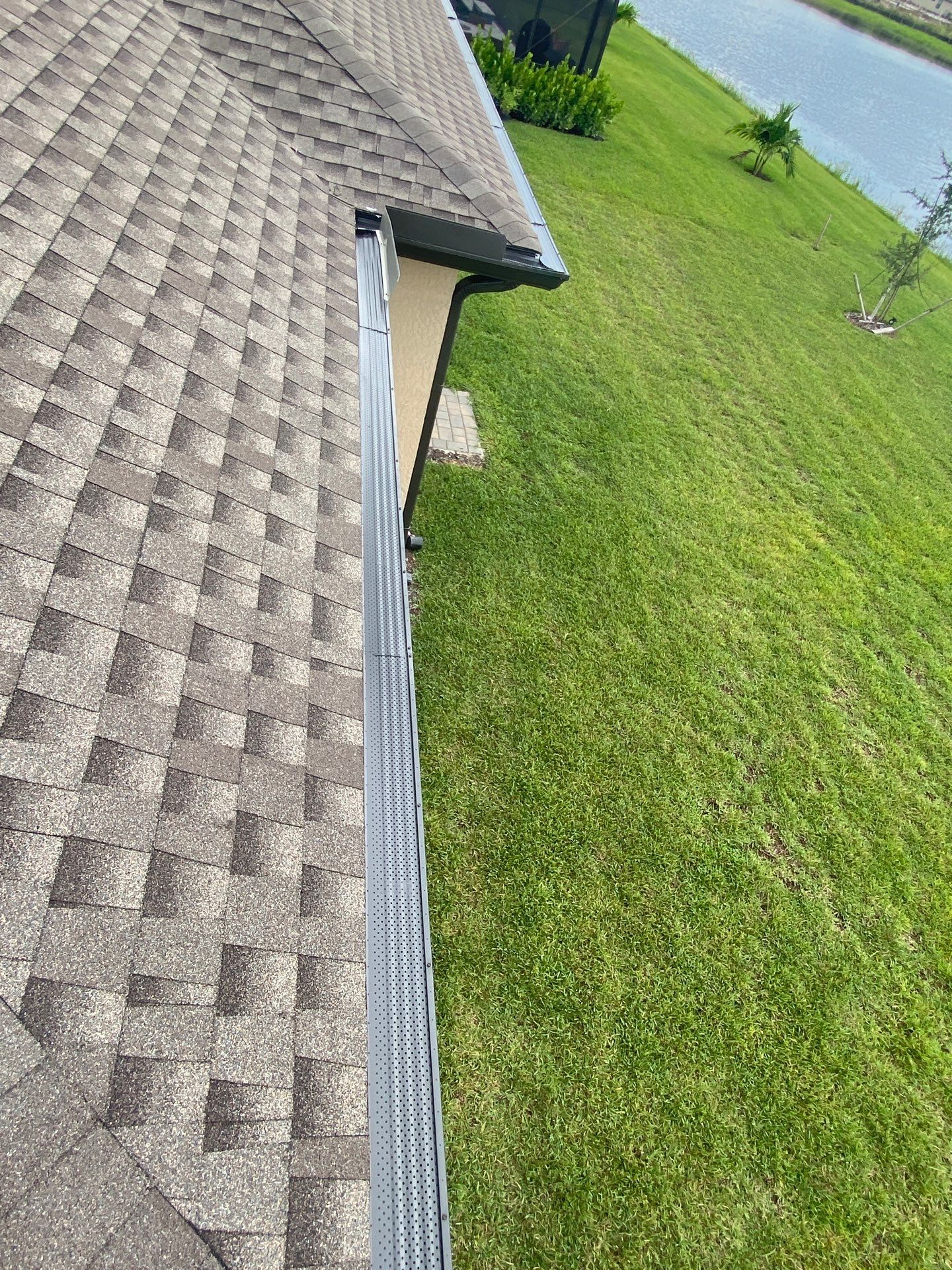 Brown Seamless Gutters for Homes in Fort Myers by Gutter Professors
