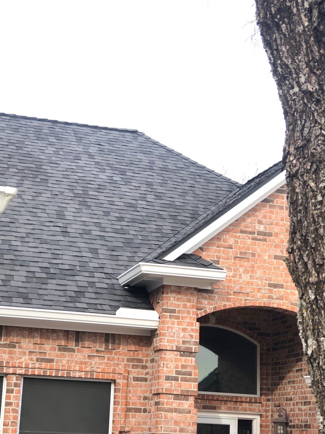 Certainteed Landmark Moire Black Roof project by Springtree Restoration 