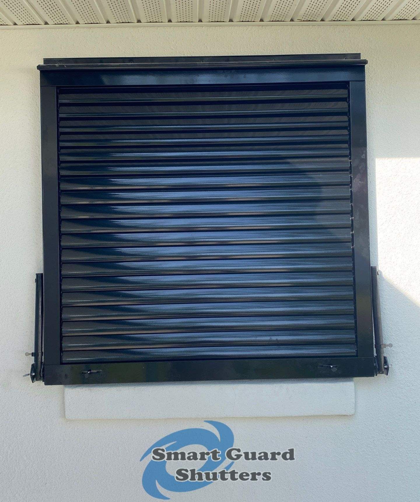 Impact Bahamas in Jet Black by Smart Guard Shutters