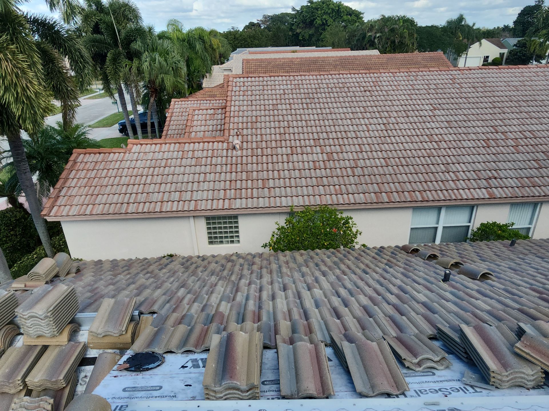 Concrete Tile Roof Replacement and Wood Decking Repair in Boca Raton by Aastro Roofing